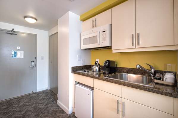 2 Queen Beds, Non-Smoking, City View, Balcony, Flat Screen Television, Microwave And Refrigerator, Kitchenette