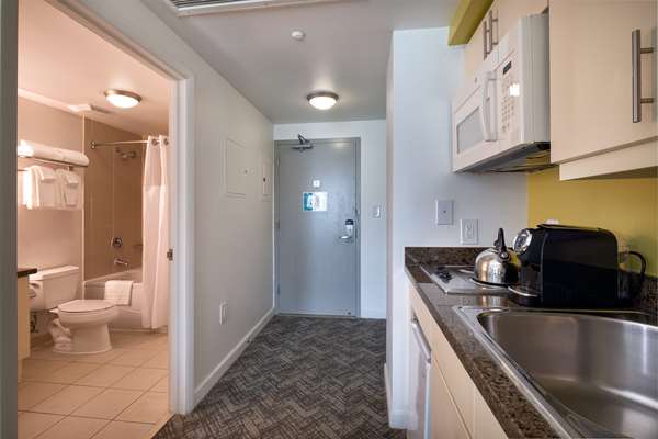 2 Queen Beds, Non-Smoking, City View, Balcony, Flat Screen Television, Microwave And Refrigerator, Kitchenette