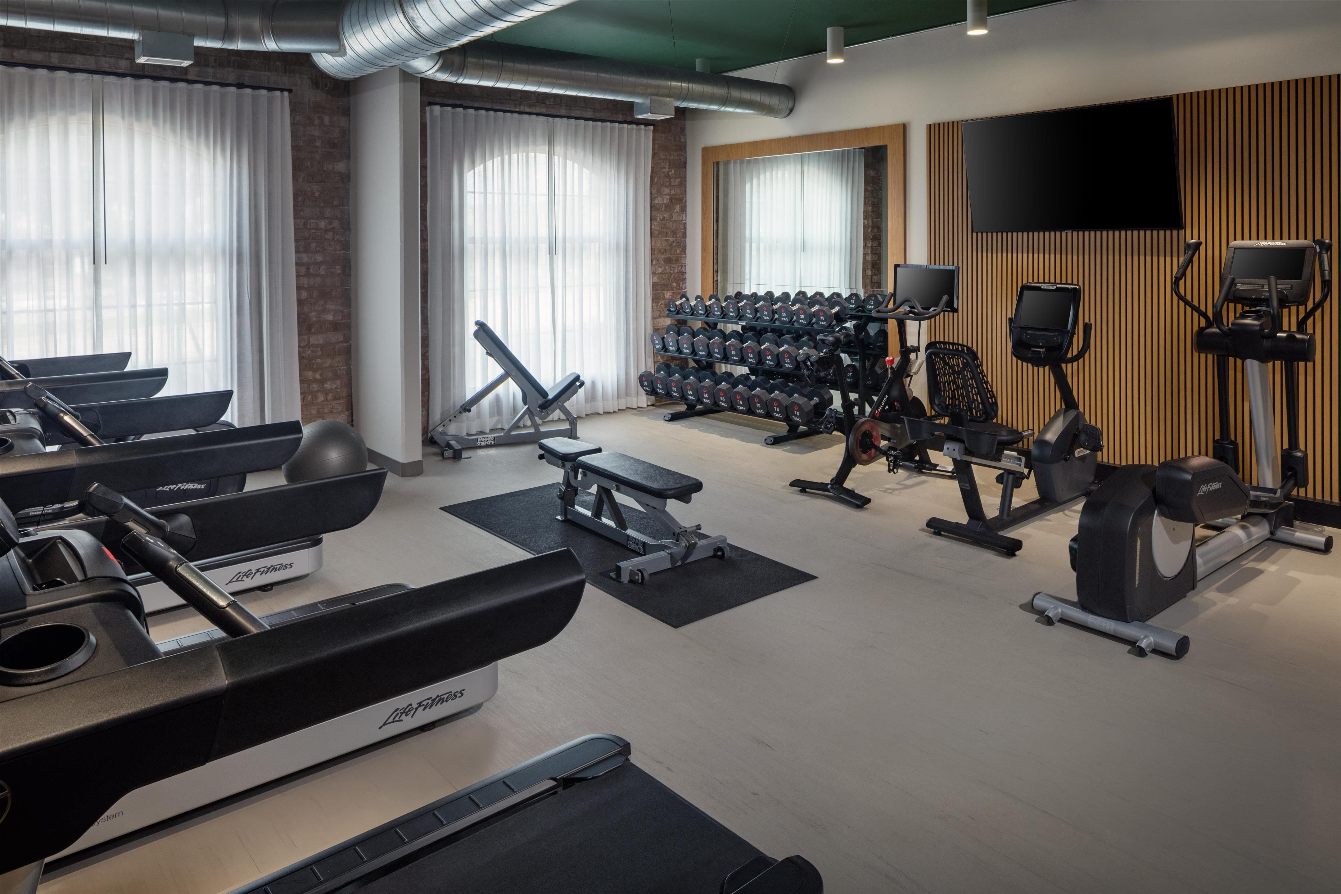 Health club fitness center gym | NYLO Dallas Plano Hotel, Tapestry Collection by Hilton