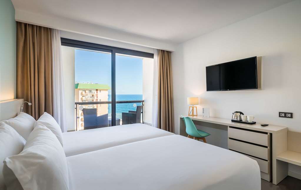 OCCIDENTAL FUENGIROLA-guestroom-Guest Room,On-Site.jpg