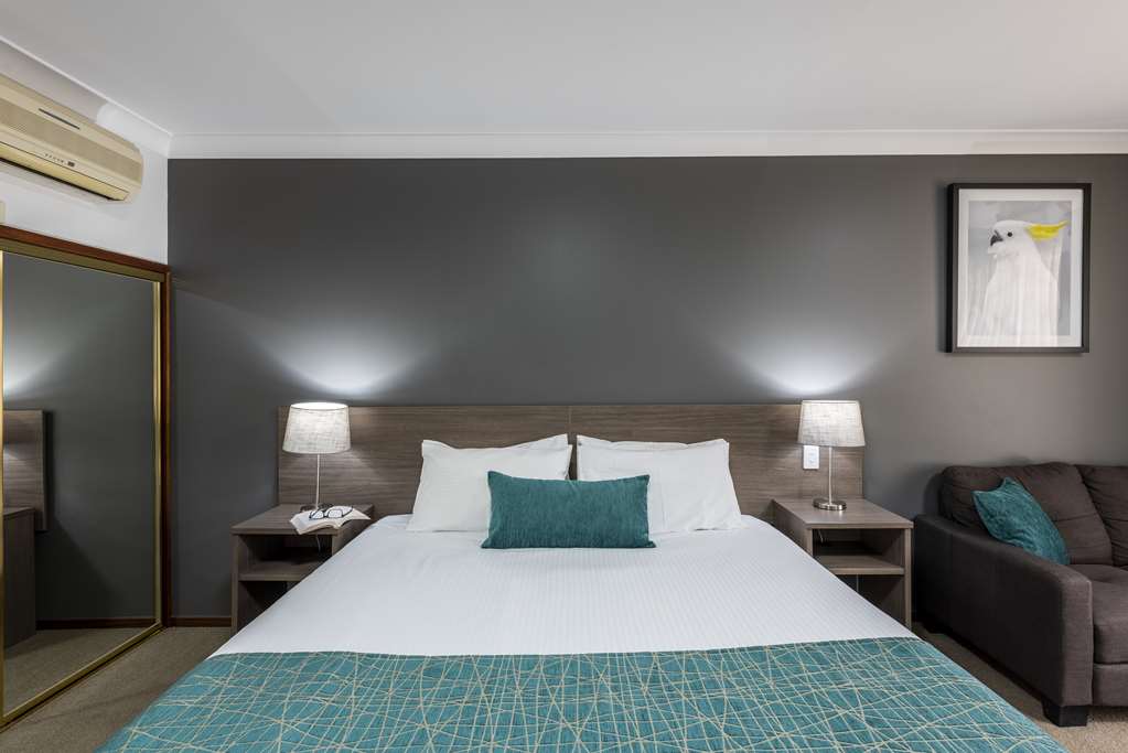 BW PLUS AMBASSADOR ORANGE-guestroom-Guest Room,On-Site.jpg