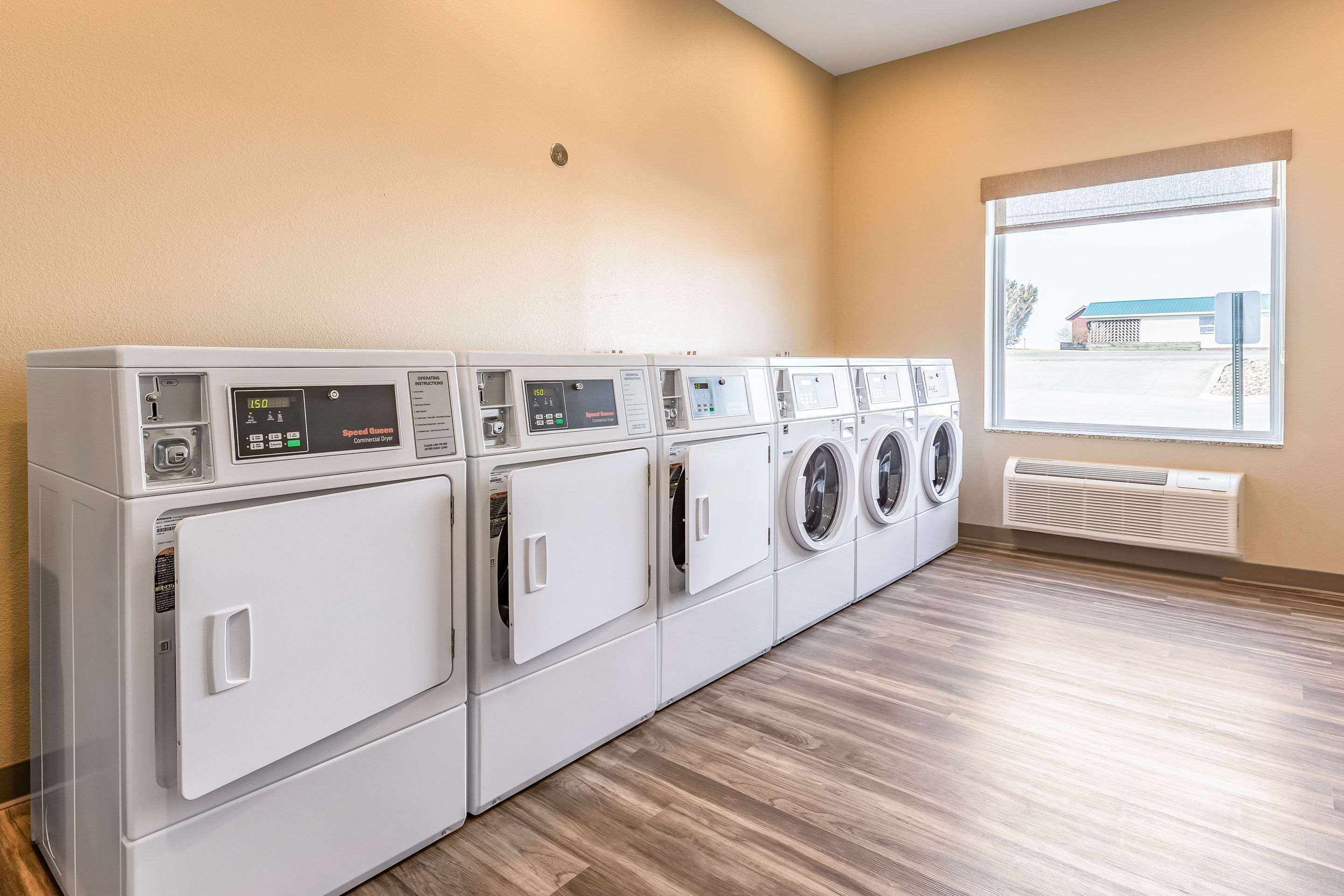 Guest laundry facilities | Sleep Inn & Suites Mt. Hope near Auction & Event Center