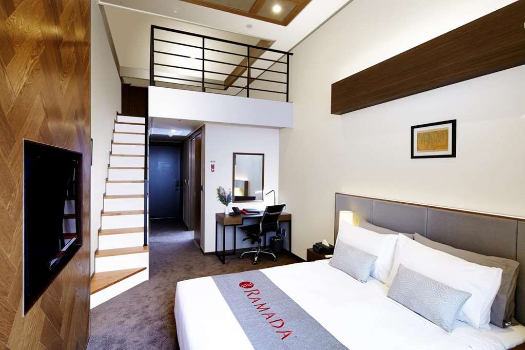 RAMADA HOTEL & SUITES BY WYNDHAM GA-guestroom-Guest Room,On-Site.jpg