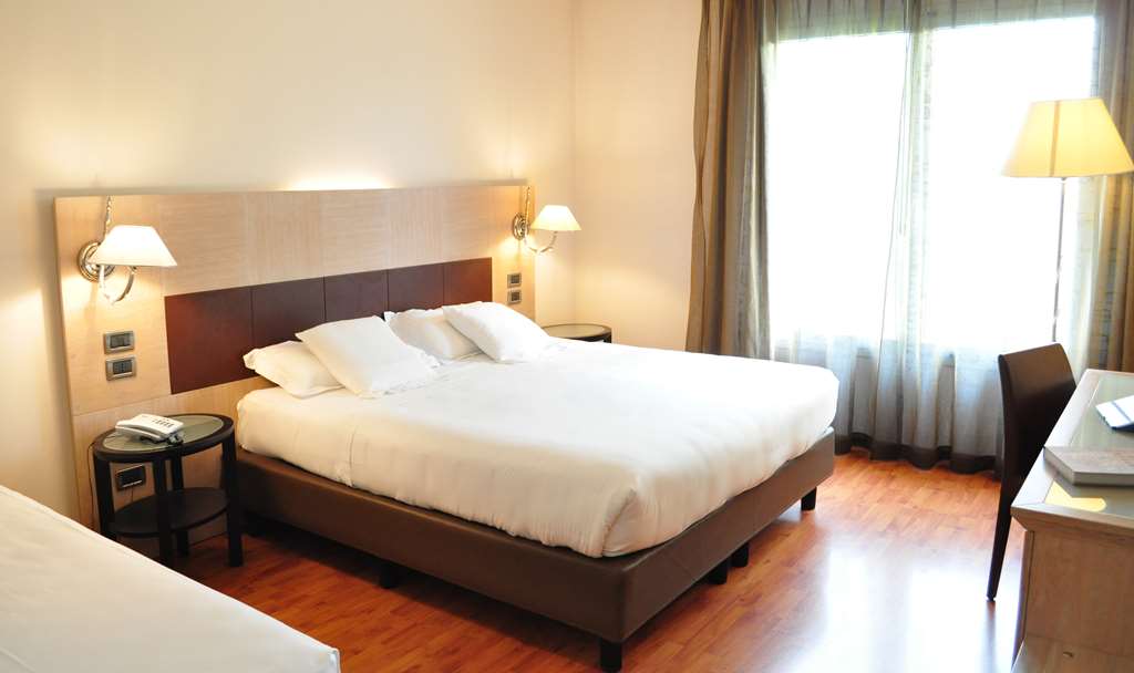 SAN GIORGIO SURE HOTEL COLLECT-guestroom-Guest Room,Bed,Queen bed,On-Site.jpg