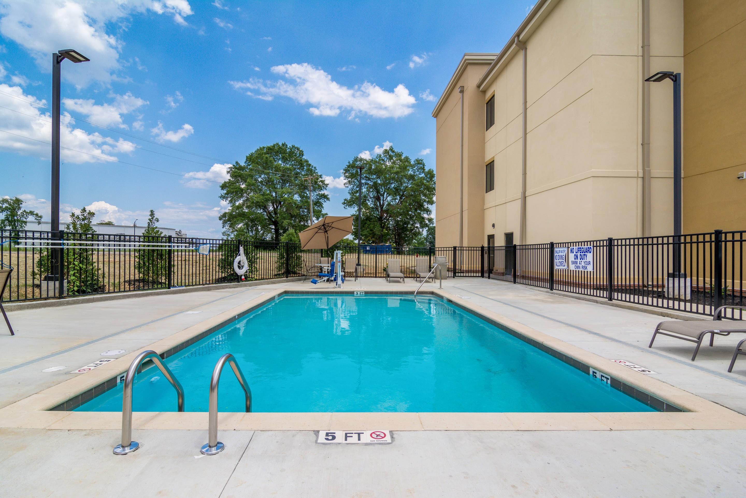 Outdoor pool | Comfort INN AND Suites