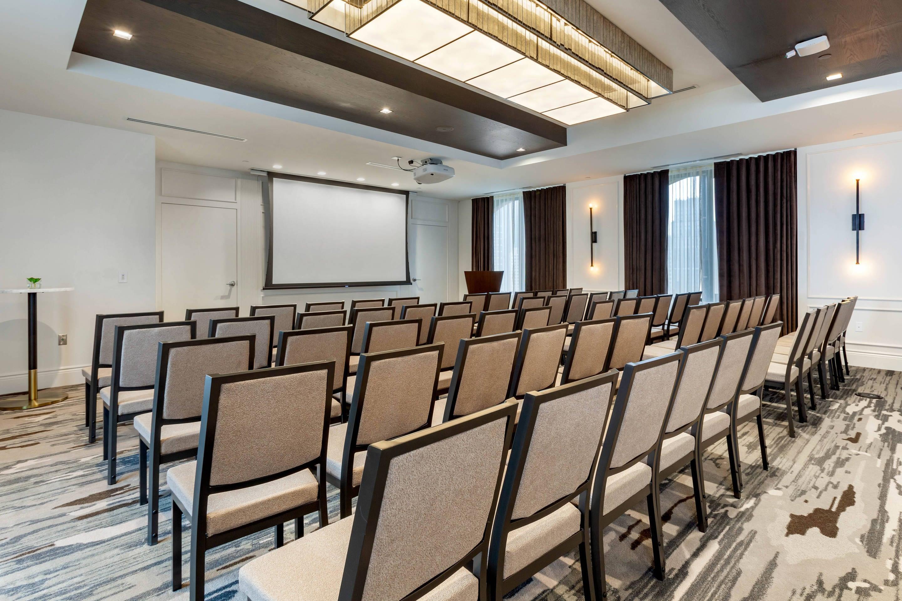 Banquet meeting room with audiovisual equipment | Cambria Hotel Houston Downtown Convention Center