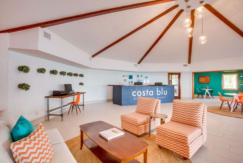 COSTA BLU BEACH RESORT, TRADEMARK C-guestroom-Sitting area,On-Site.jpg