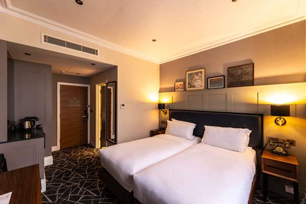 SUPERIOR TWIN/2 SINGLE BEDS