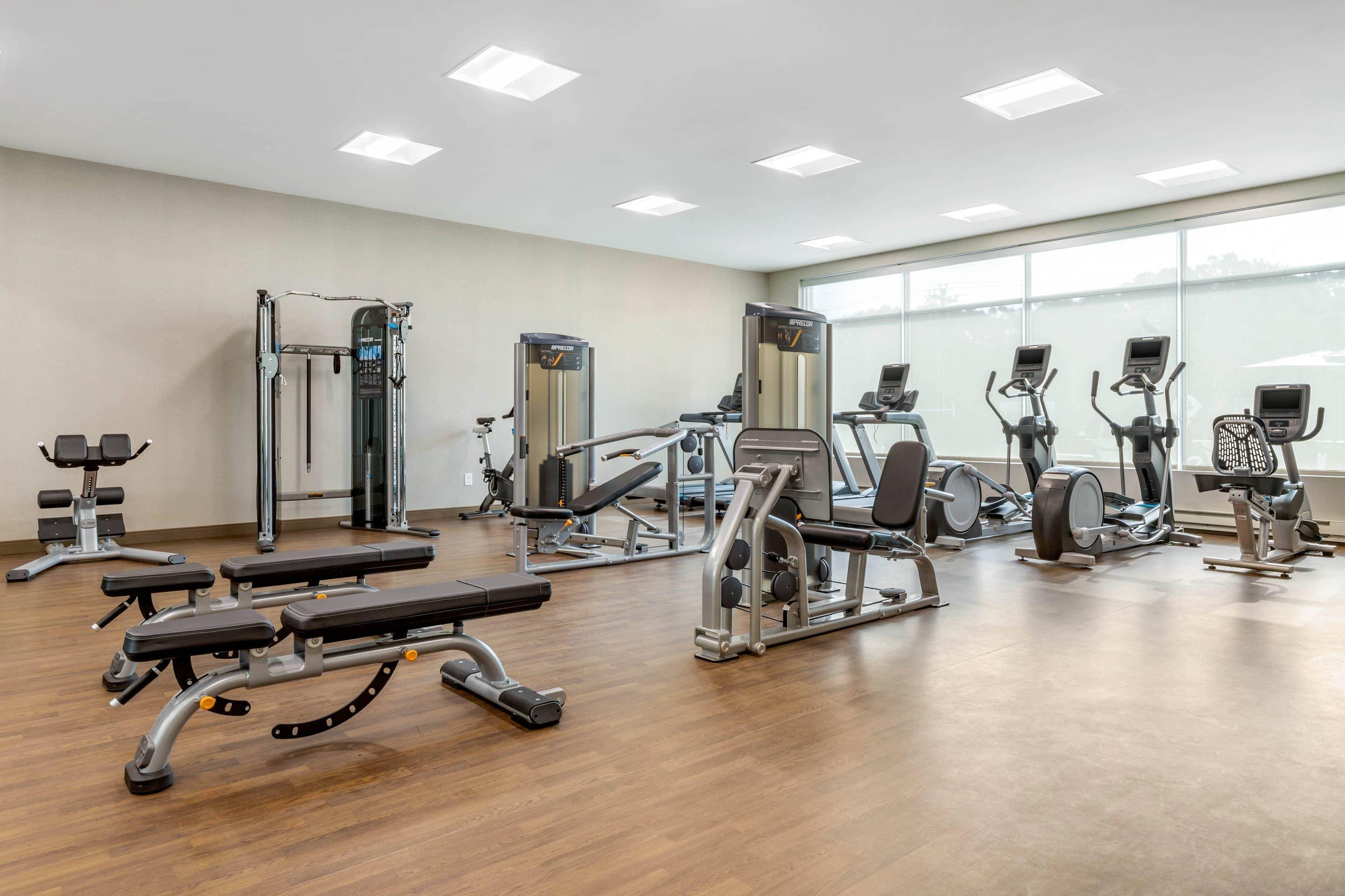 Exercise room with cardio equipment and weights | Cambria Hotel Fort Mill