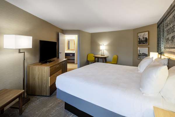 Suite - 1 King 2 Queen Beds, Non-Smoking, Two Bedrooms, Microwave And Mini-Refrigerator, Wi-Fi, Shower Only, Full Breakfast