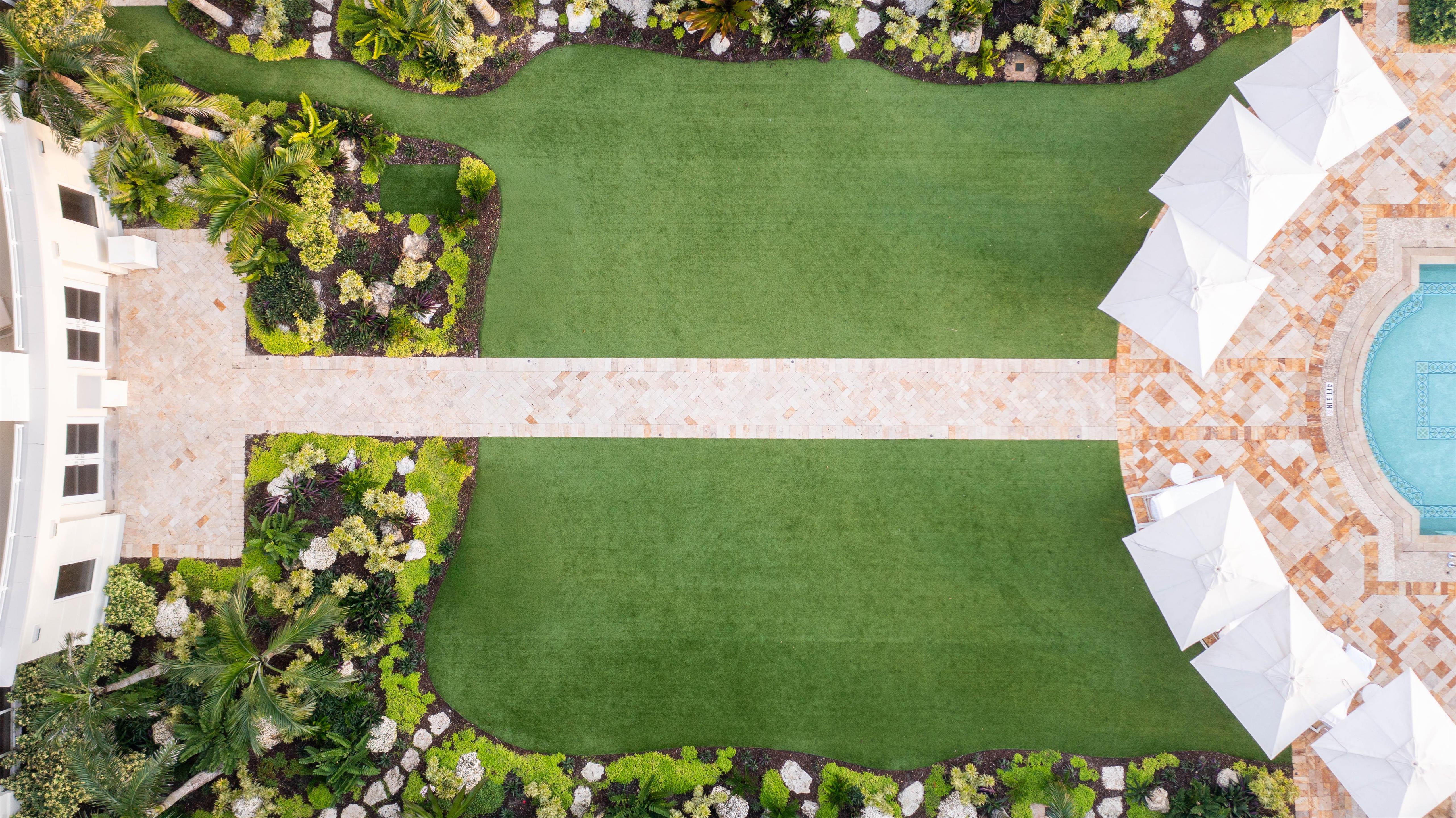 Courtyard Lawn Aerial | Eau Resort & Spa