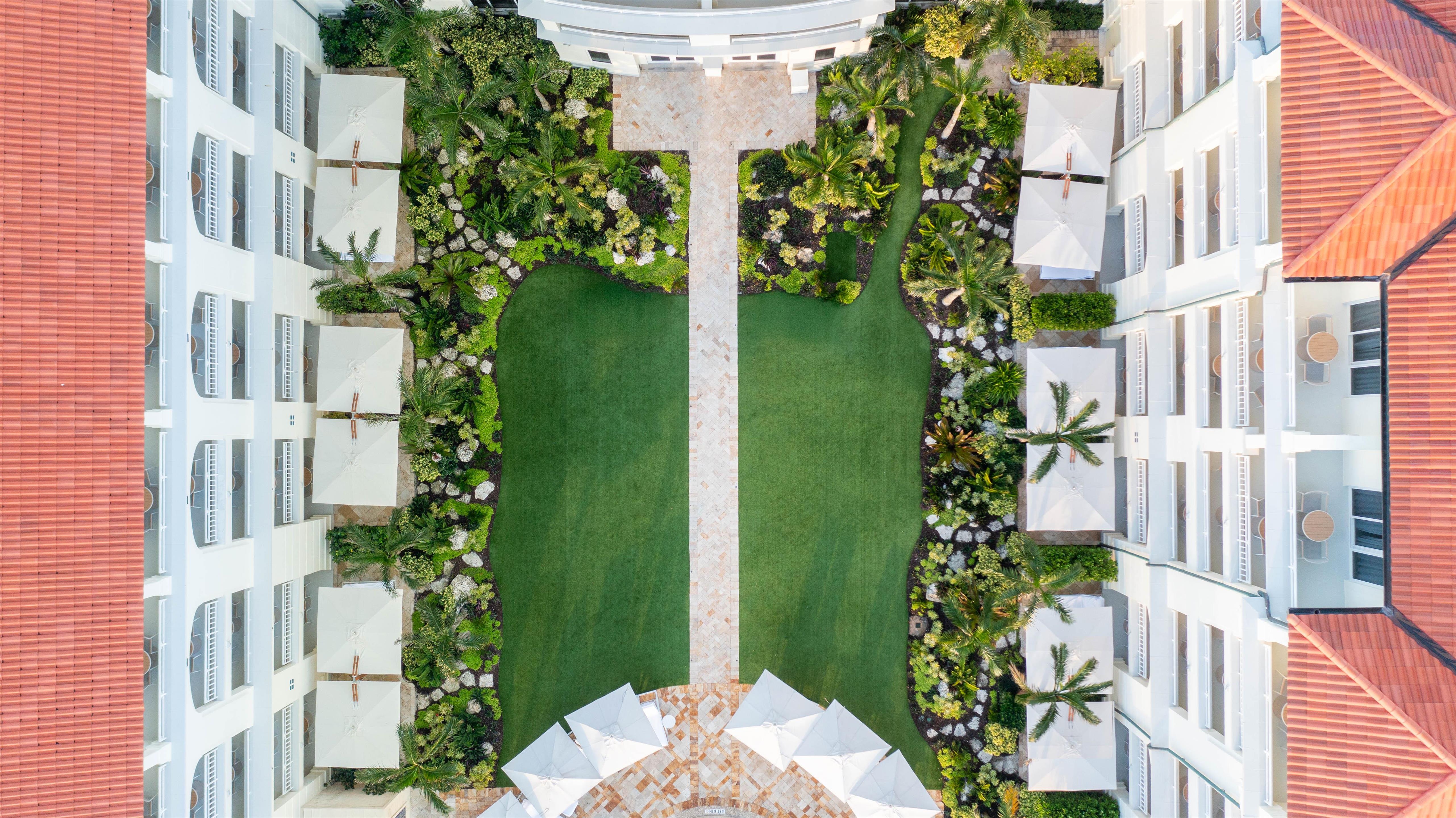 Courtyard Lawn Aerial | Eau Resort & Spa