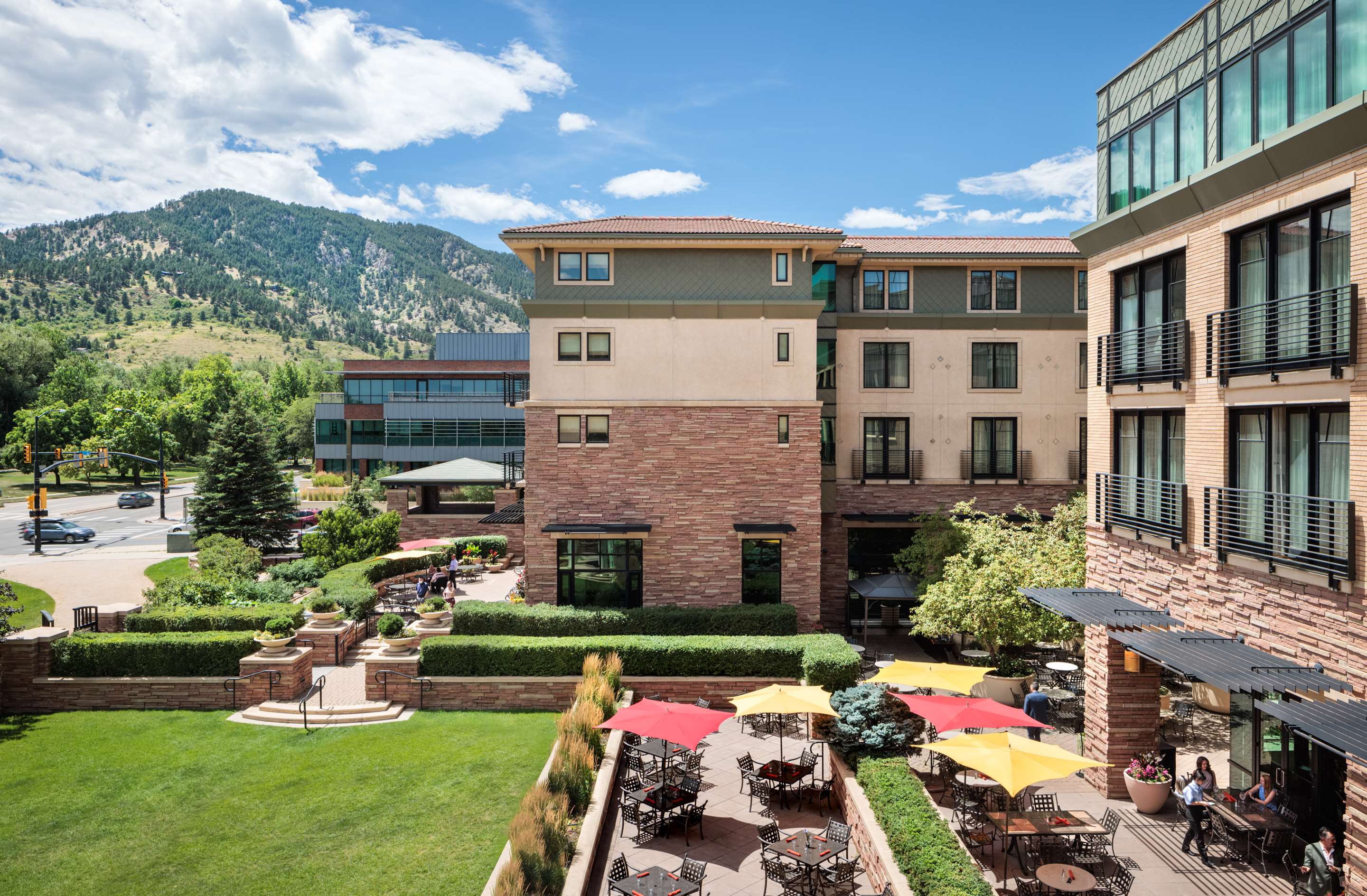 Views of the lawn terrace and mountain range | St Julien Hotel and Spa