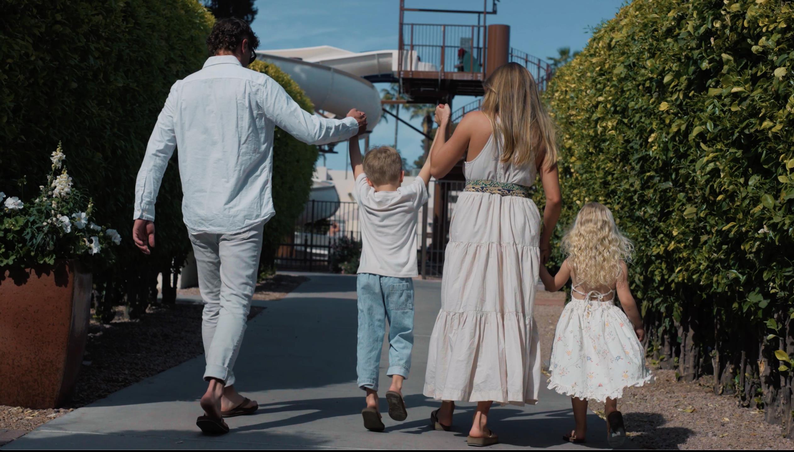Family walking towards Tower Pool at The Wigwam | The Wigwam