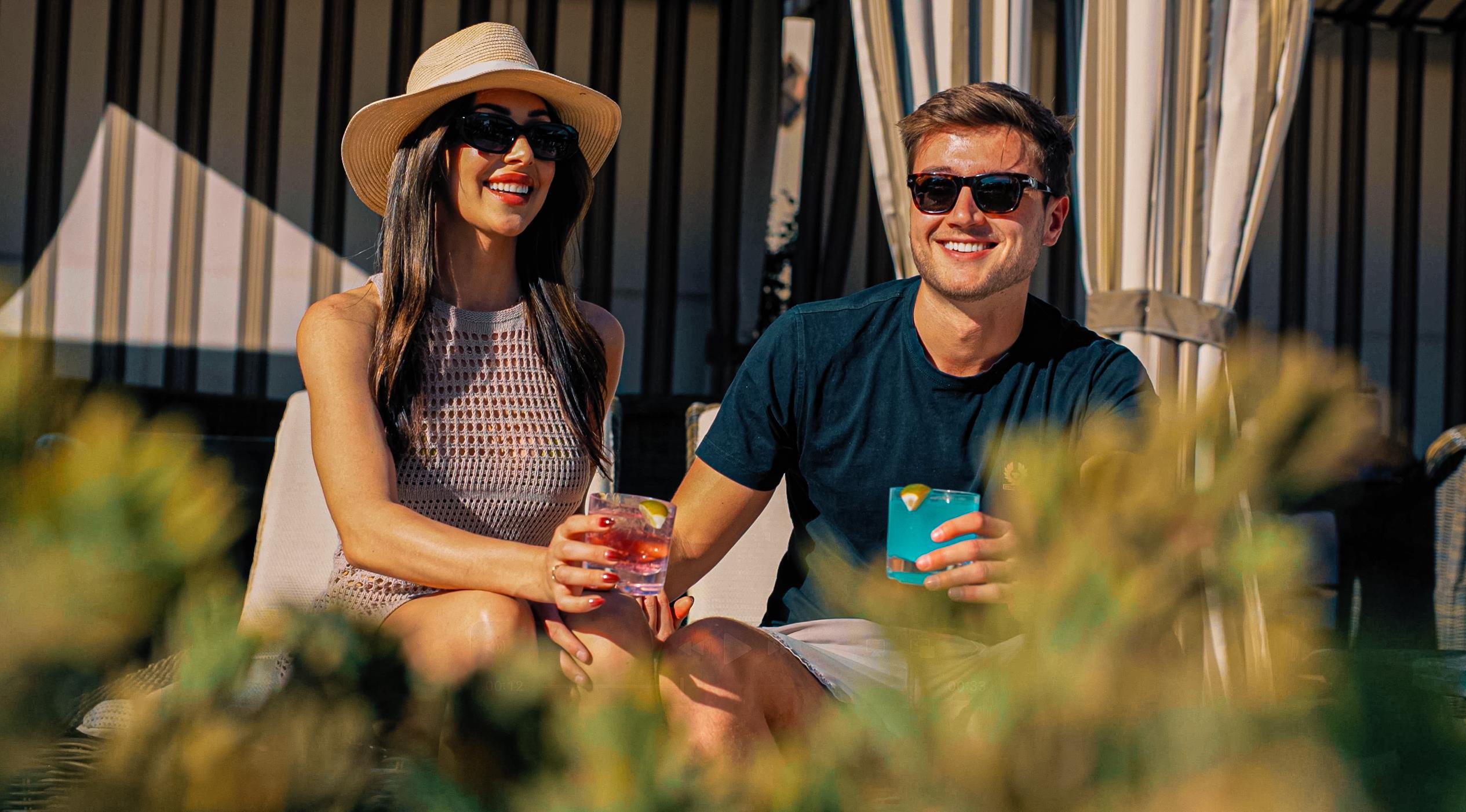 Couple enjoying cabana at Tower Pool