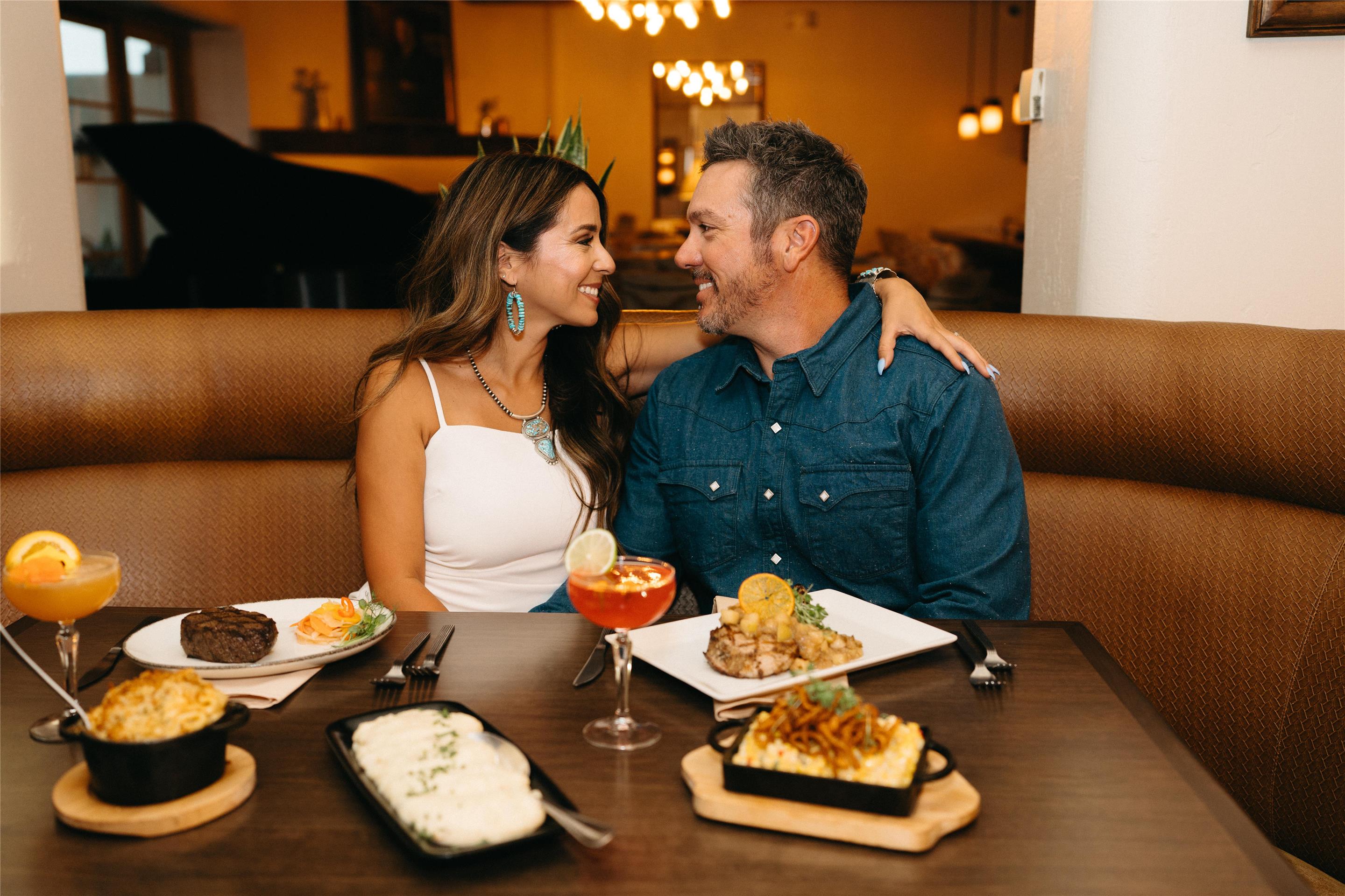 Couple enjoying date night at Litchfield's restaurant at The Wigwam | The Wigwam