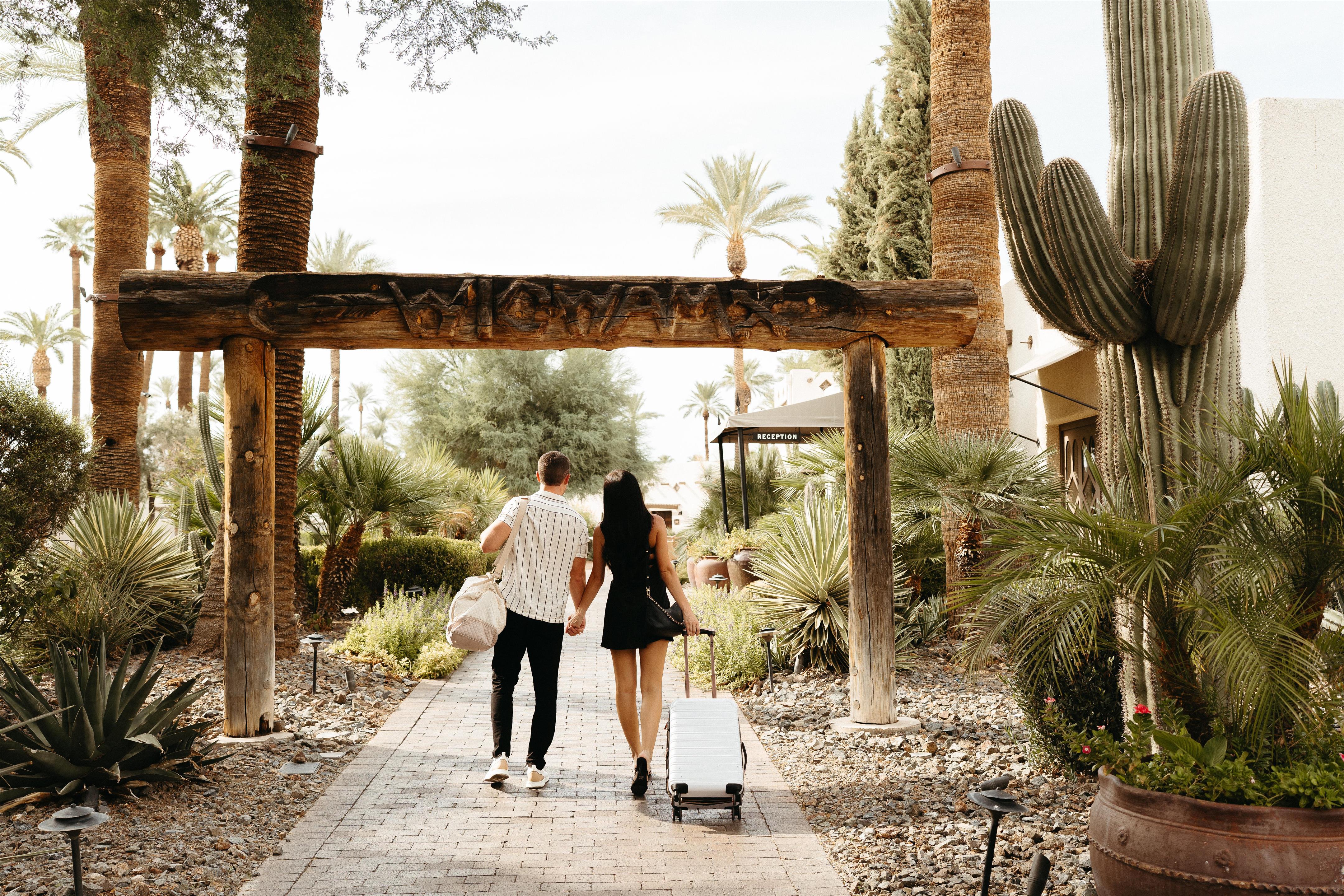 Couple checking in for romantic weekend | The Wigwam