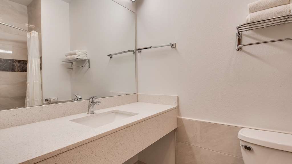 SureStay by Best Western Baytown-guestroom-Guest Room,Bathroom,On-Site.jpg