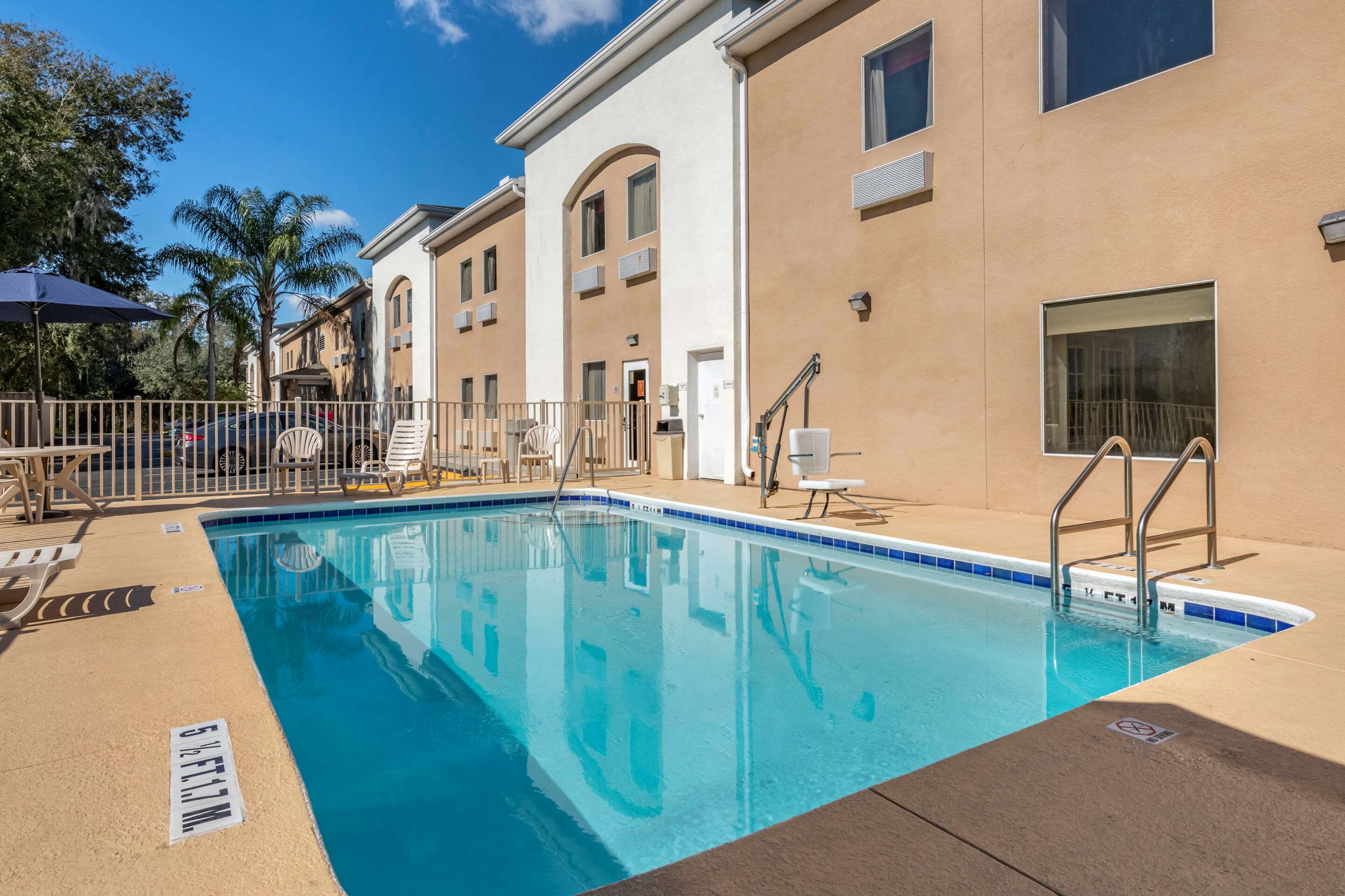 Relax by the pool | Quality Inn Zephyrhills-dade City