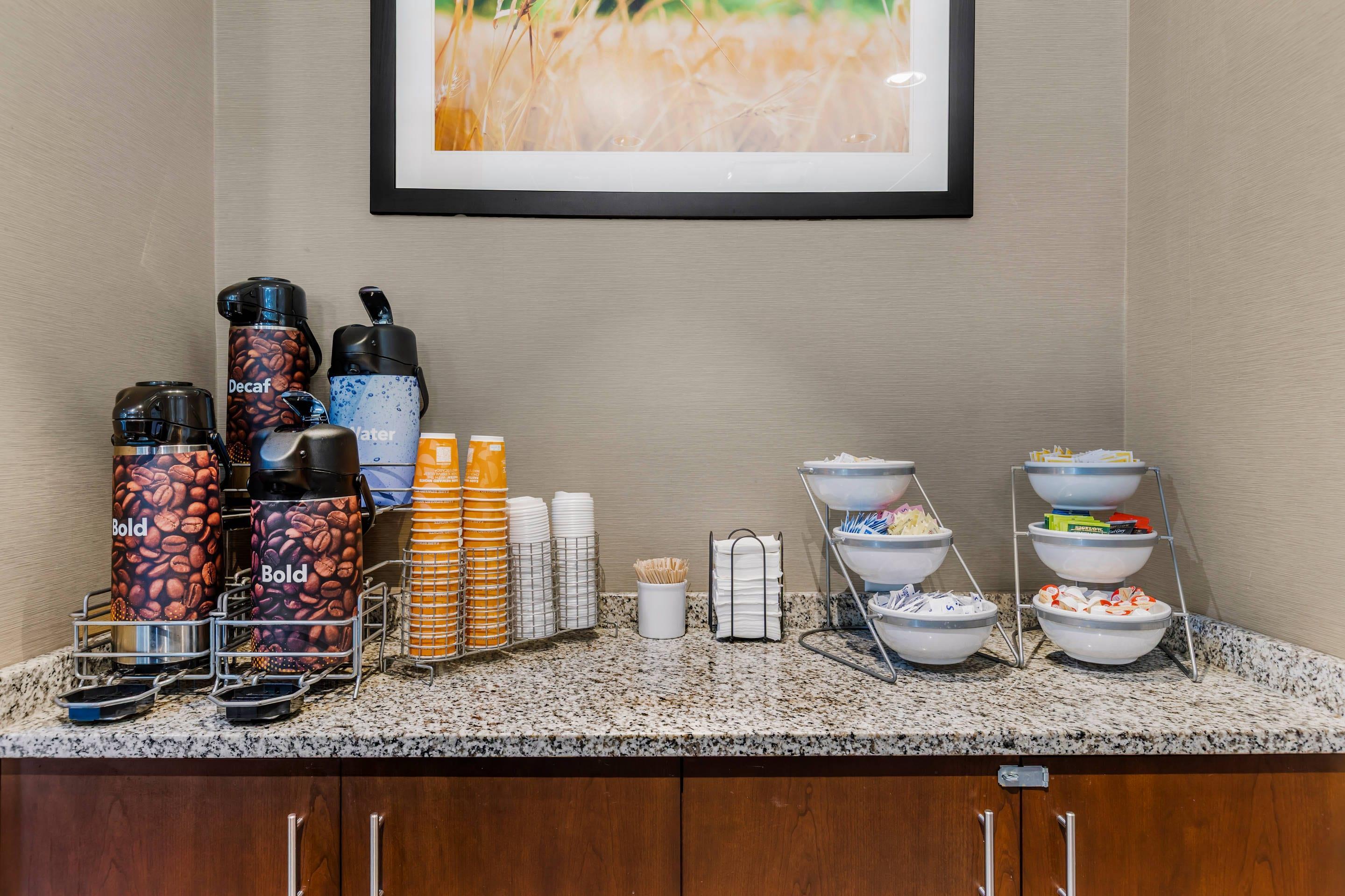 Enjoy coffee in the lobby | Comfort Inn & Suites