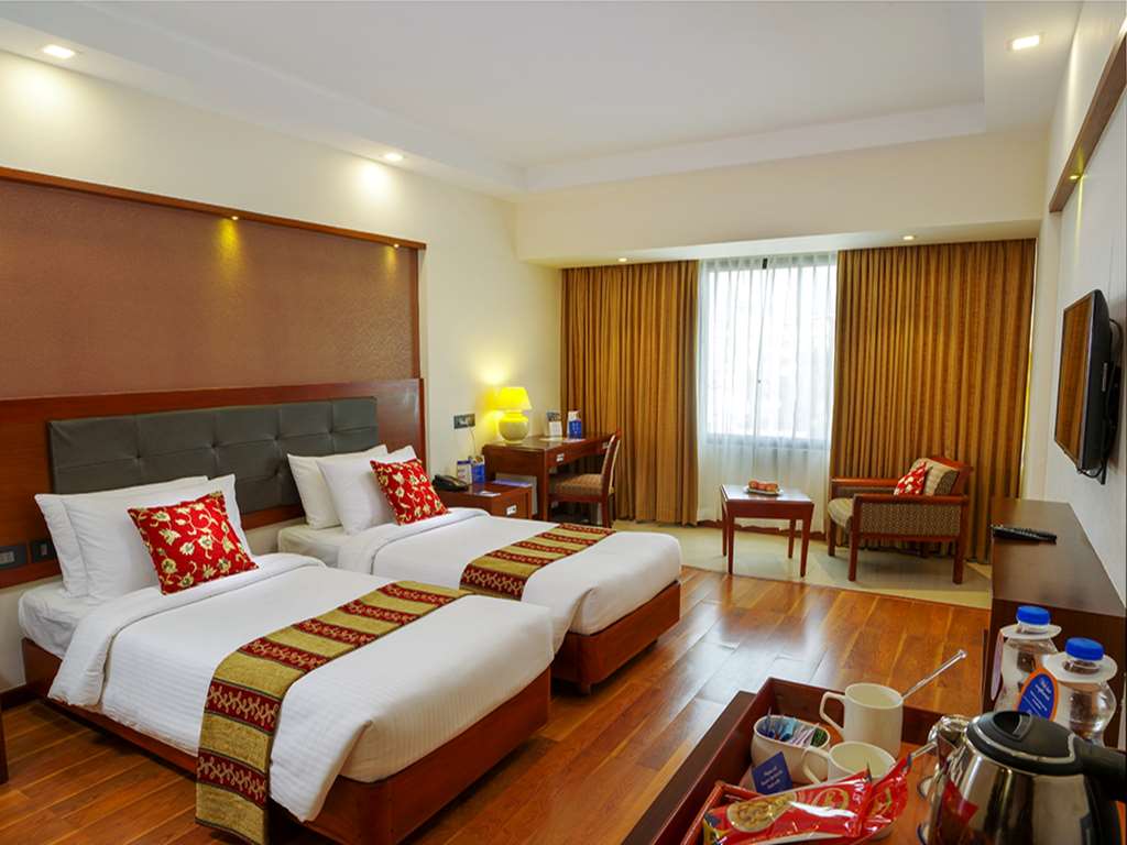 CLASSIC SAROVAR PORTICO THIRUVANANT-guestroom-Guest Room,On-Site.jpg