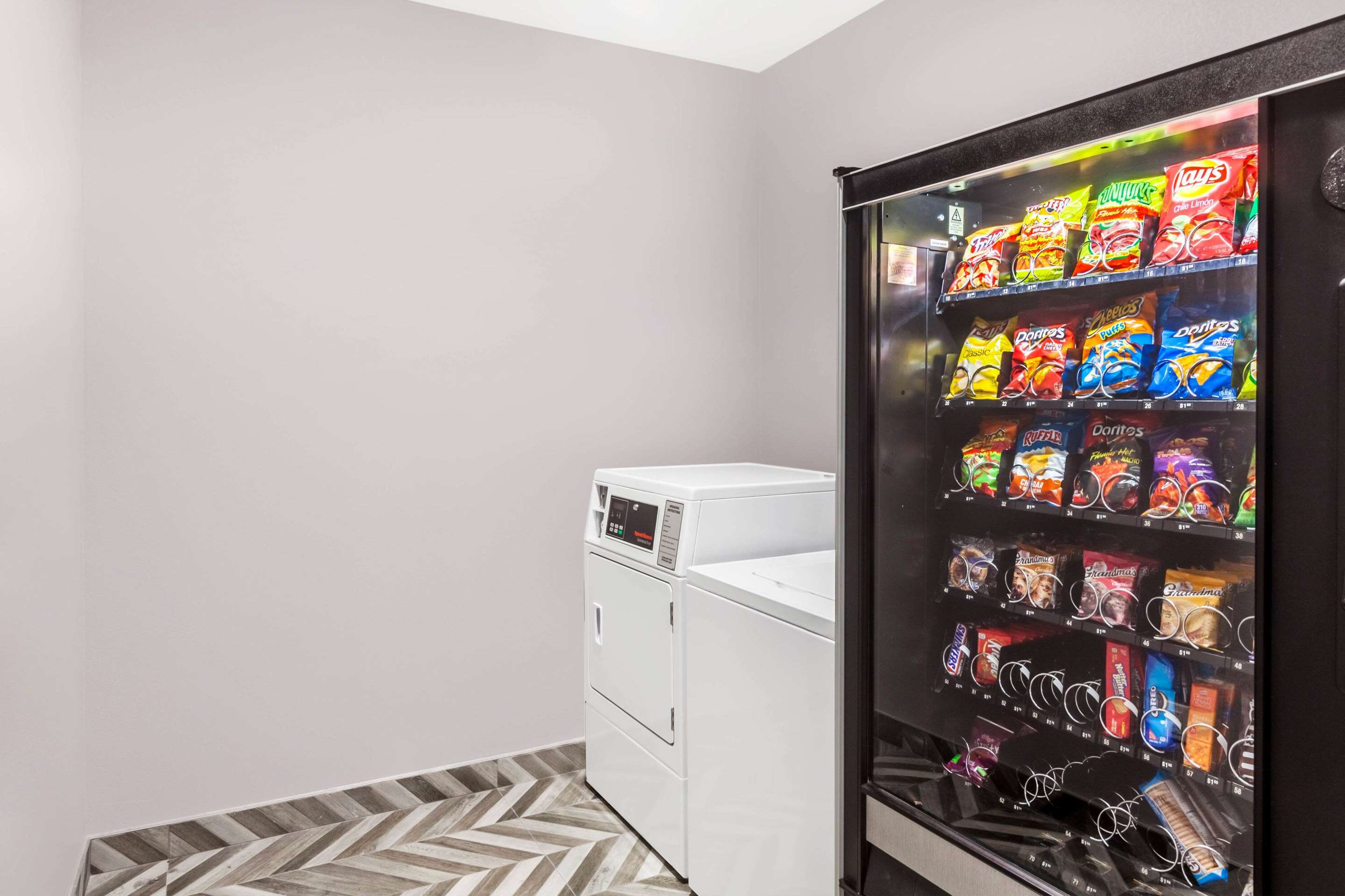Laundry | Super 8 by Wyndham Kingwood Houston North