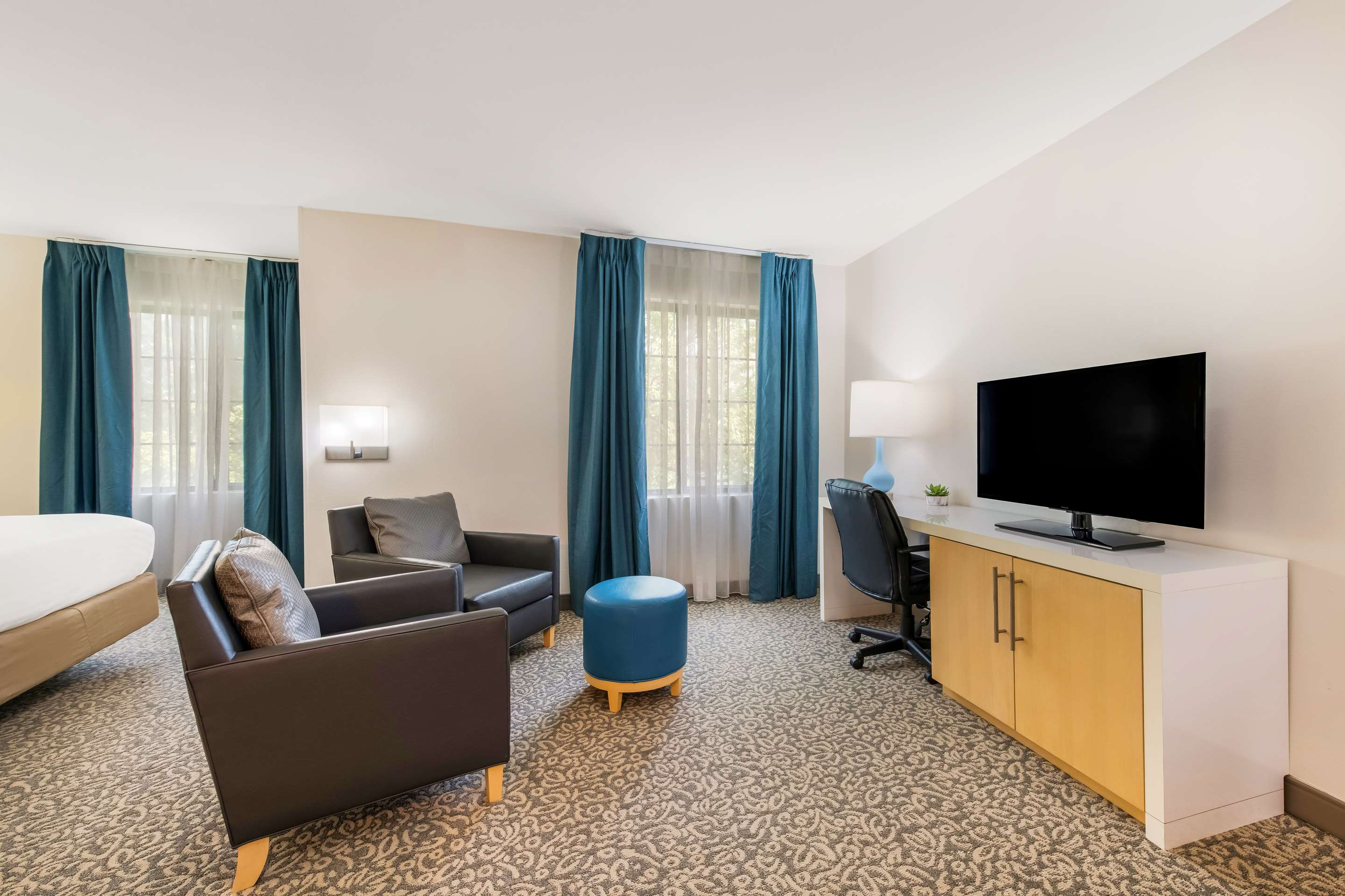 Guest Room - ADA Studio Suite Living Space | Sonesta ES Suites Charlotte Arrowood