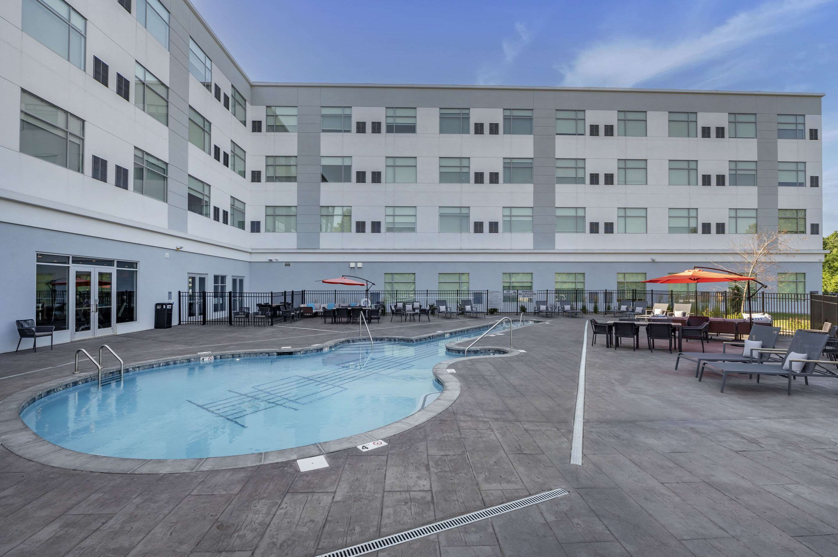 Relax by the pool | Cambria Hotel Nashville Airport