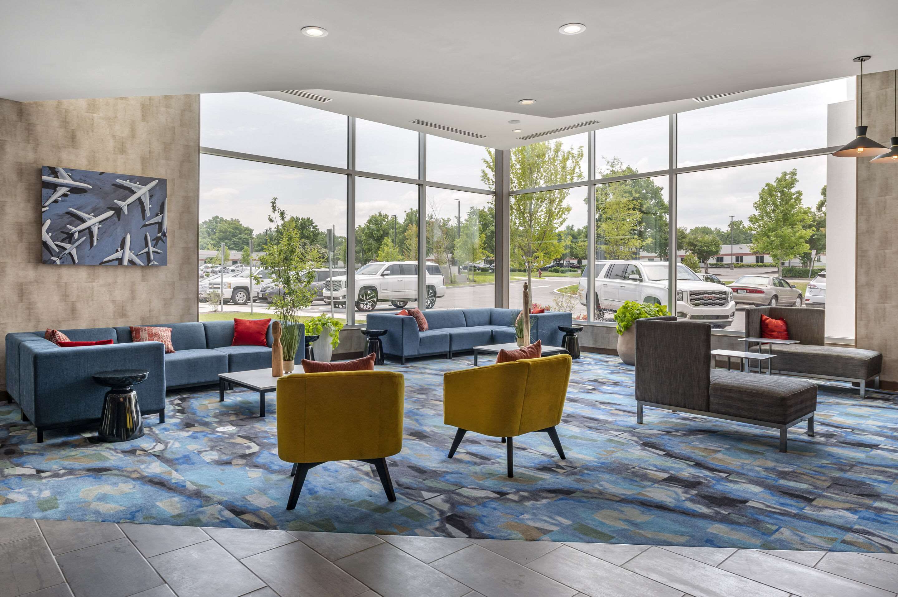 Lobby with sitting area | Cambria Hotel Nashville Airport