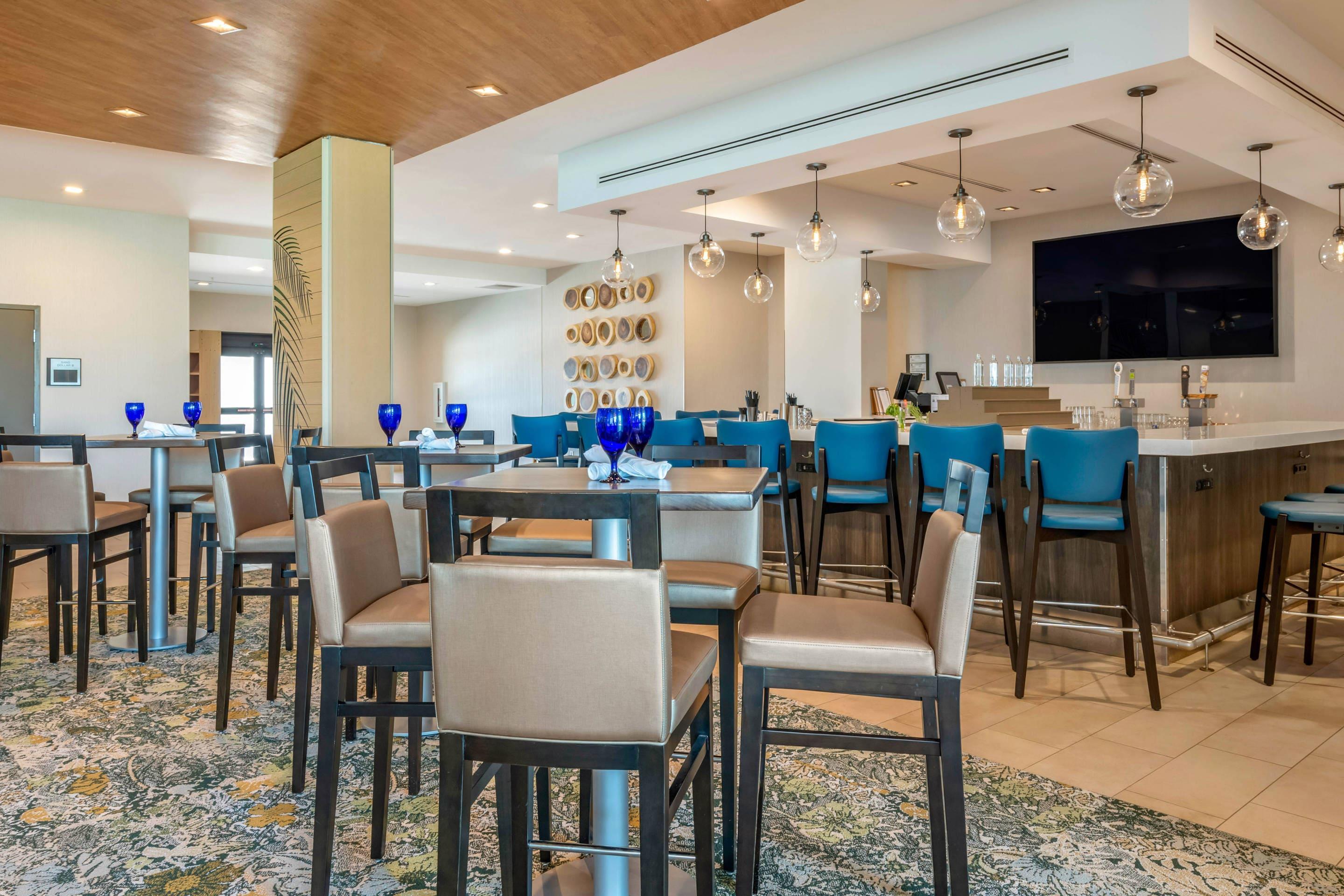 On-site restaurant | Cambria Hotel St Petersburg-Madeira Beach Marina