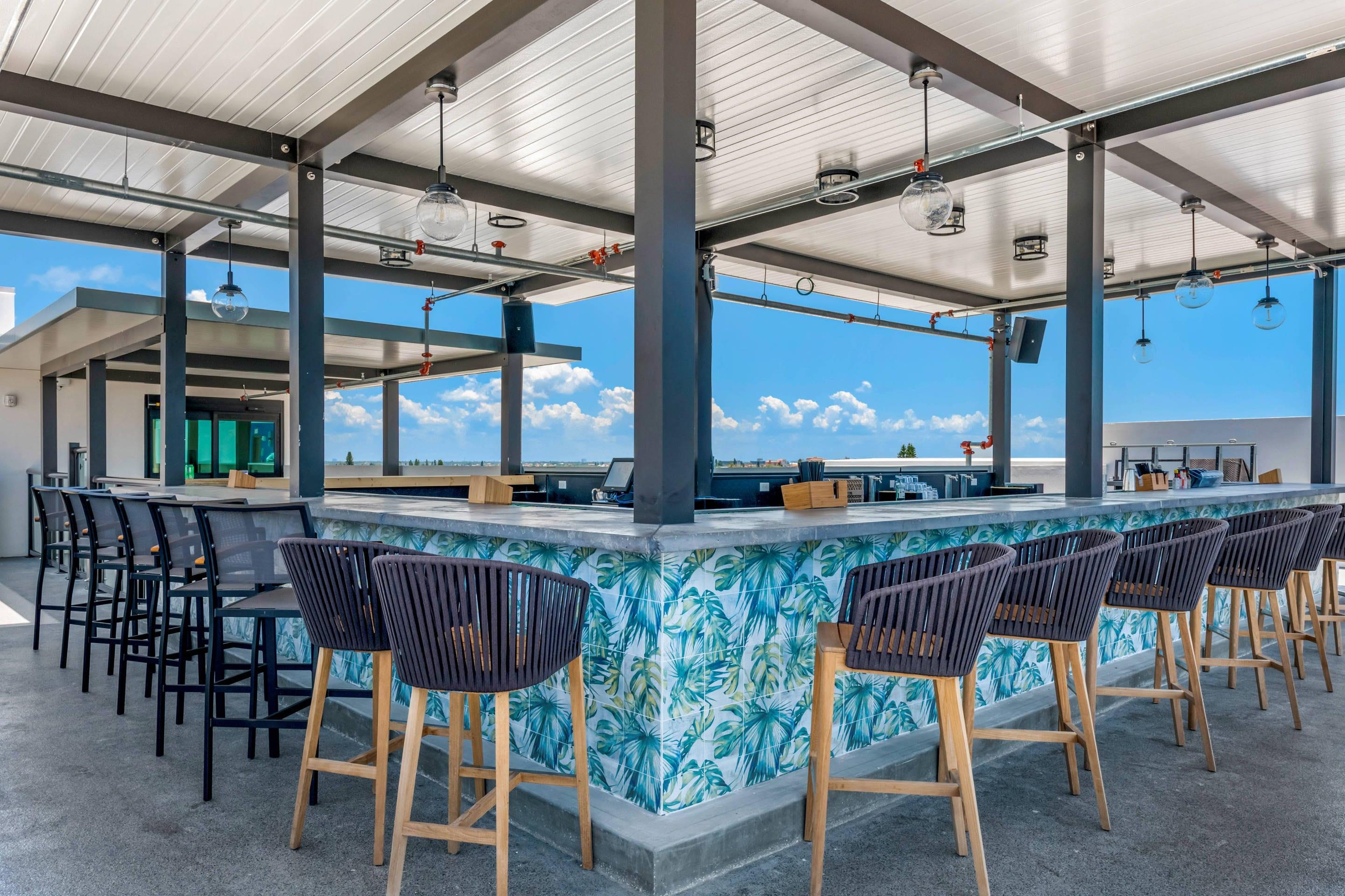 Hotel patio | Cambria Hotel St Petersburg-Madeira Beach Marina