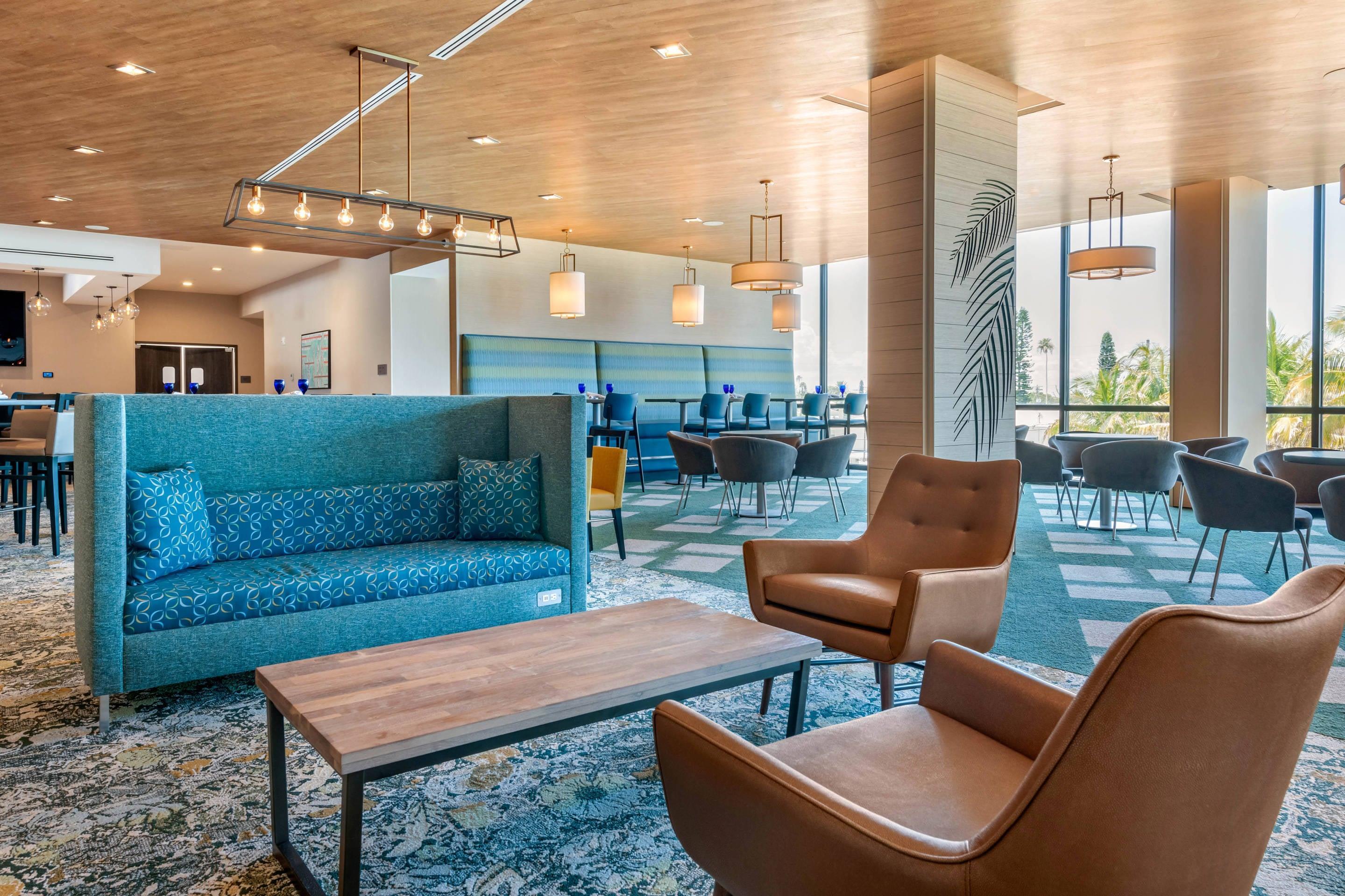 Lobby with sitting area | Cambria Hotel St Petersburg-Madeira Beach Marina