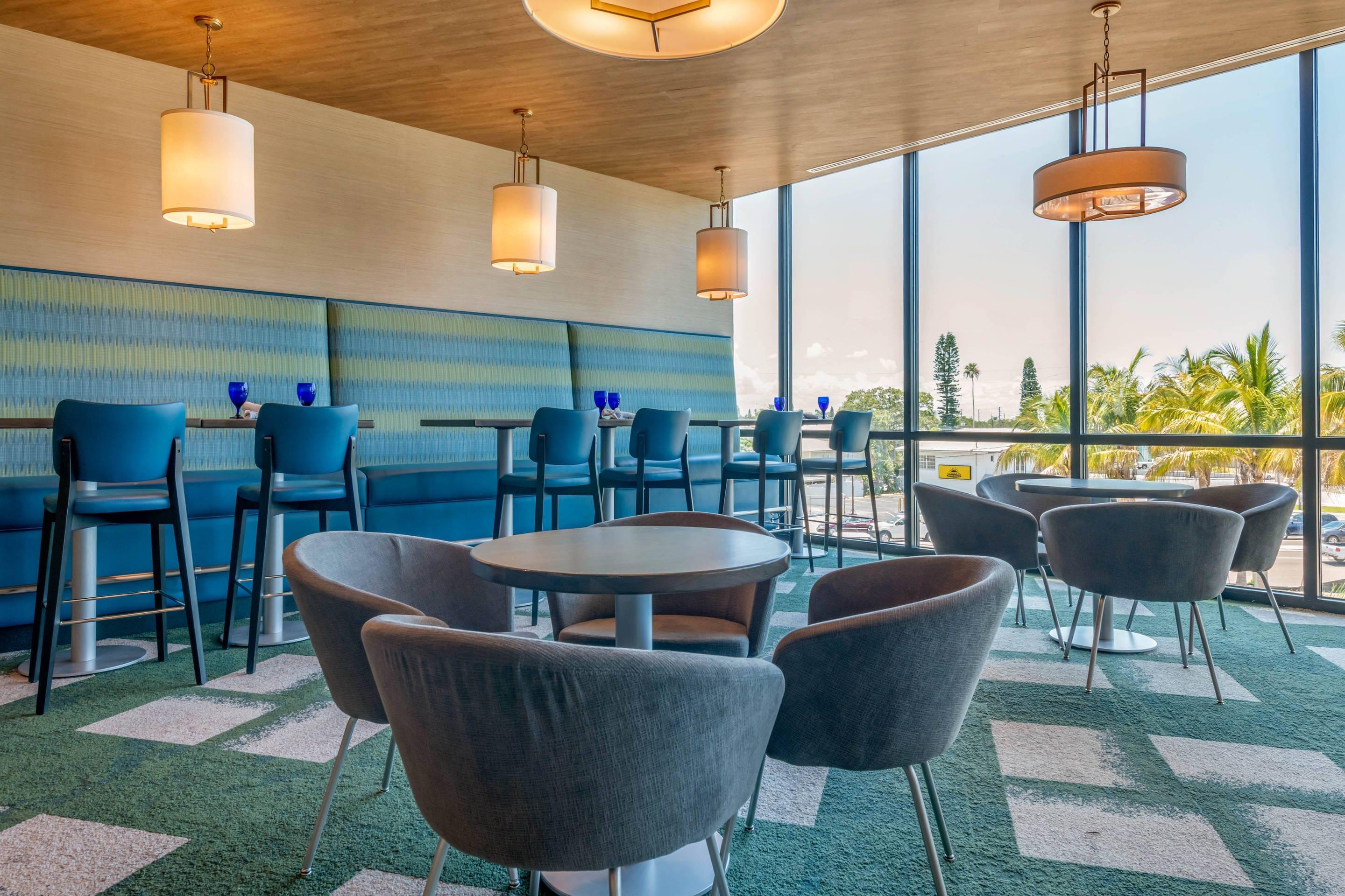Lobby with sitting area | Cambria Hotel St Petersburg-Madeira Beach Marina