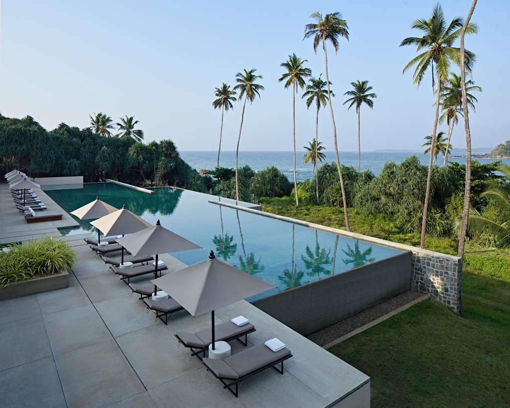 AMANWELLA-guestroom-Guest Room,Guest Room Amenity,Pool,On-Site,Outdoor/Exterior,Exterior View of Building.jpg