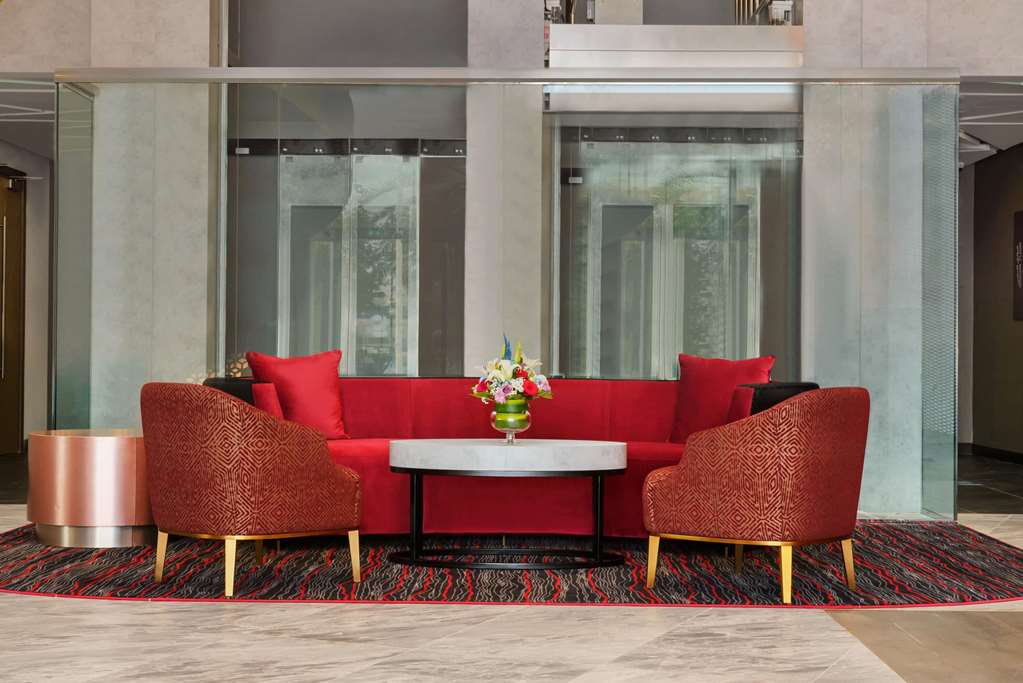 RAMADA ENCORE BY WYNDHAM MUSCAT AL--guestroom-Sitting area,On-Site.jpg