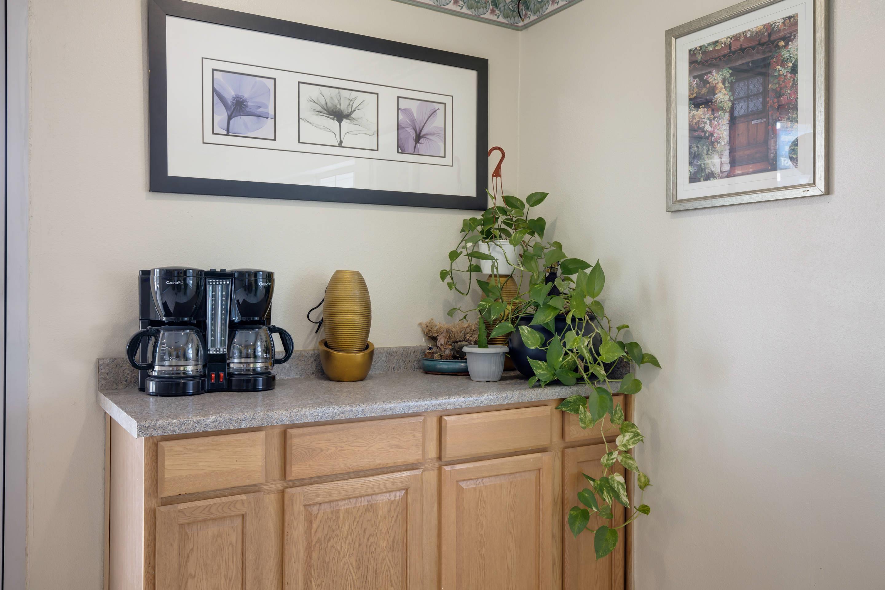 Enjoy coffee in the lobby | Rodeway Inn & Suites