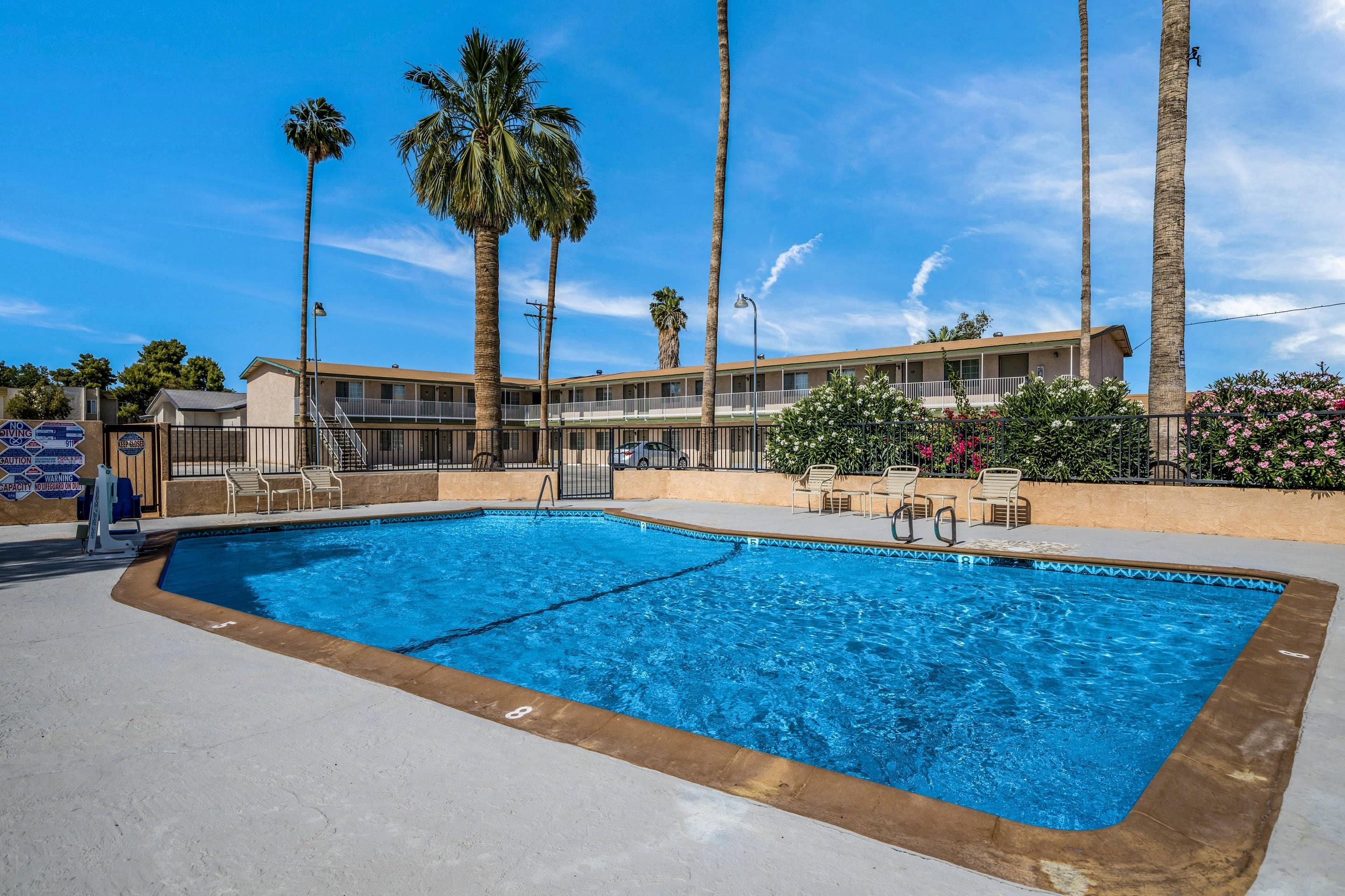 Outdoor pool | Rodeway Inn & Suites