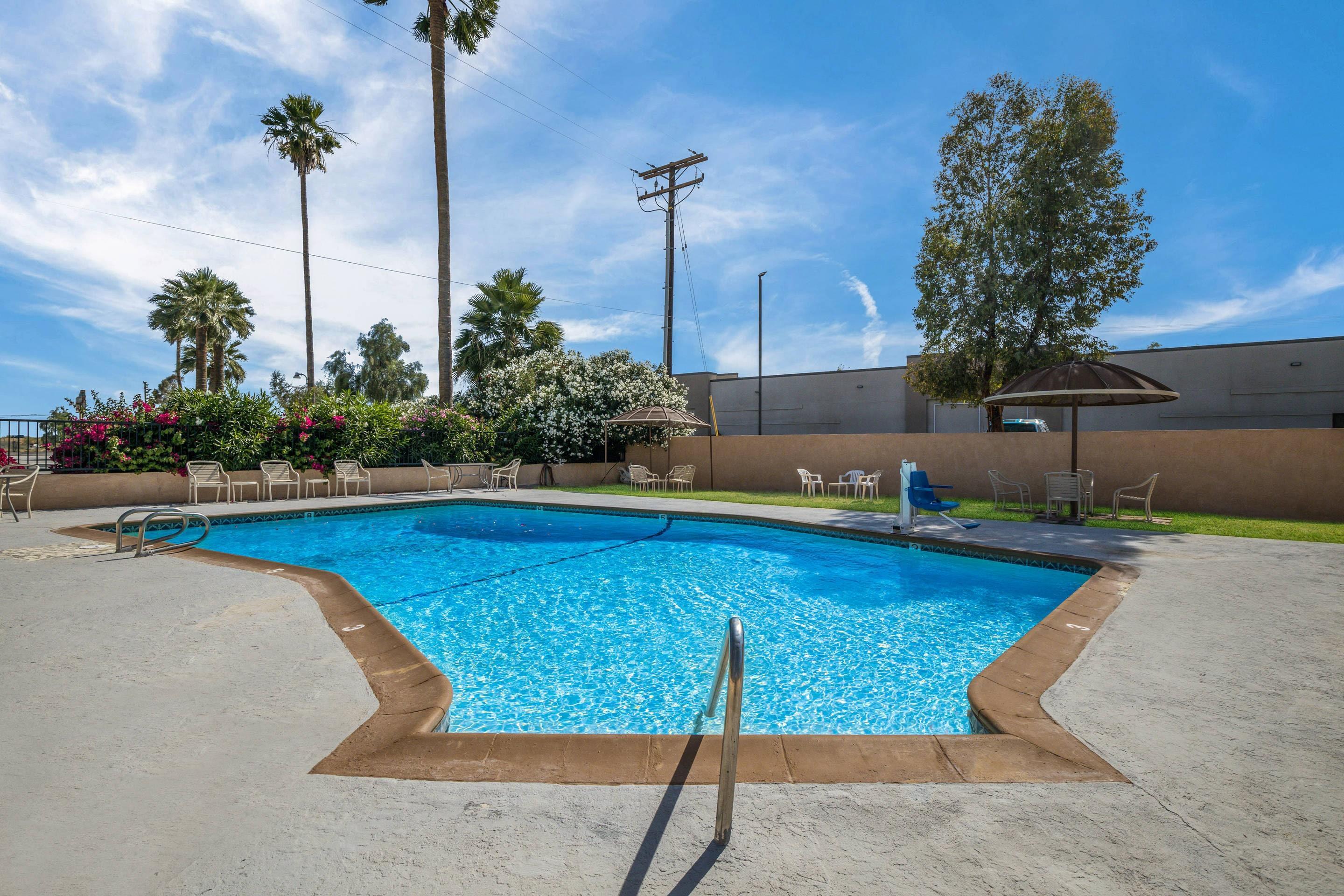Outdoor pool | Rodeway Inn & Suites
