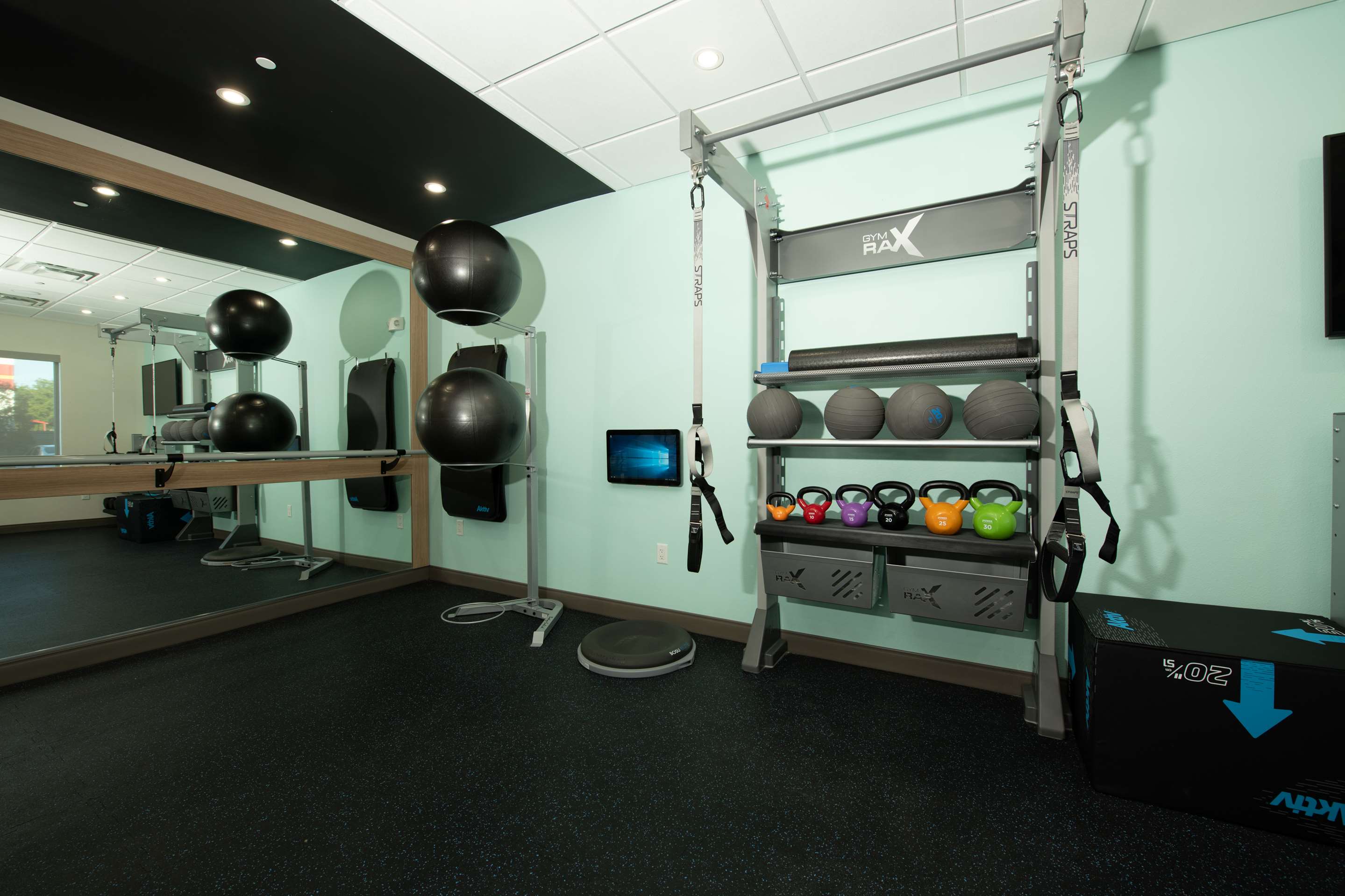 Health club fitness center gym | Tru By Hilton The Colony