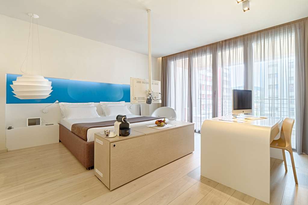 THE ROOMS HOTEL AND RESIDENCE-guestroom-Guest Room,Suite,On-Site.jpg