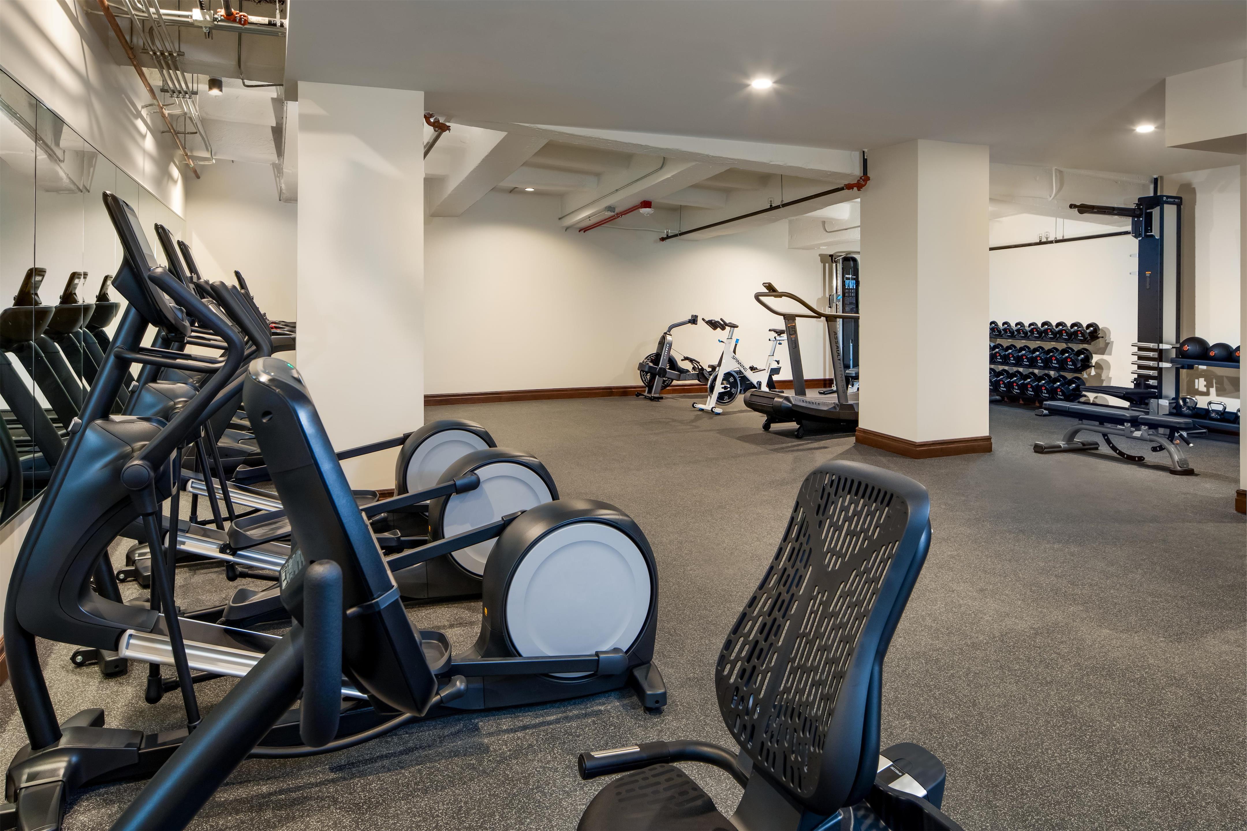 Health club fitness center gym | The Peregrine Omaha Downtown, Curio Collection by Hilton