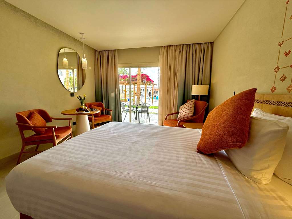 Naama Bay Promenade Beach Resort - Tap to explore photos