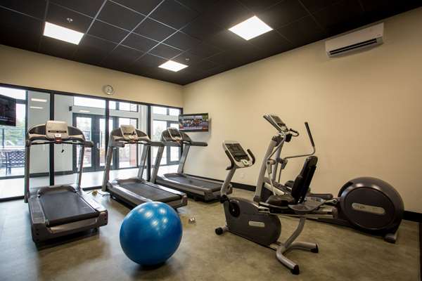 Fitness/ Exercise Room - La Cache a Maxime Hotel Scott