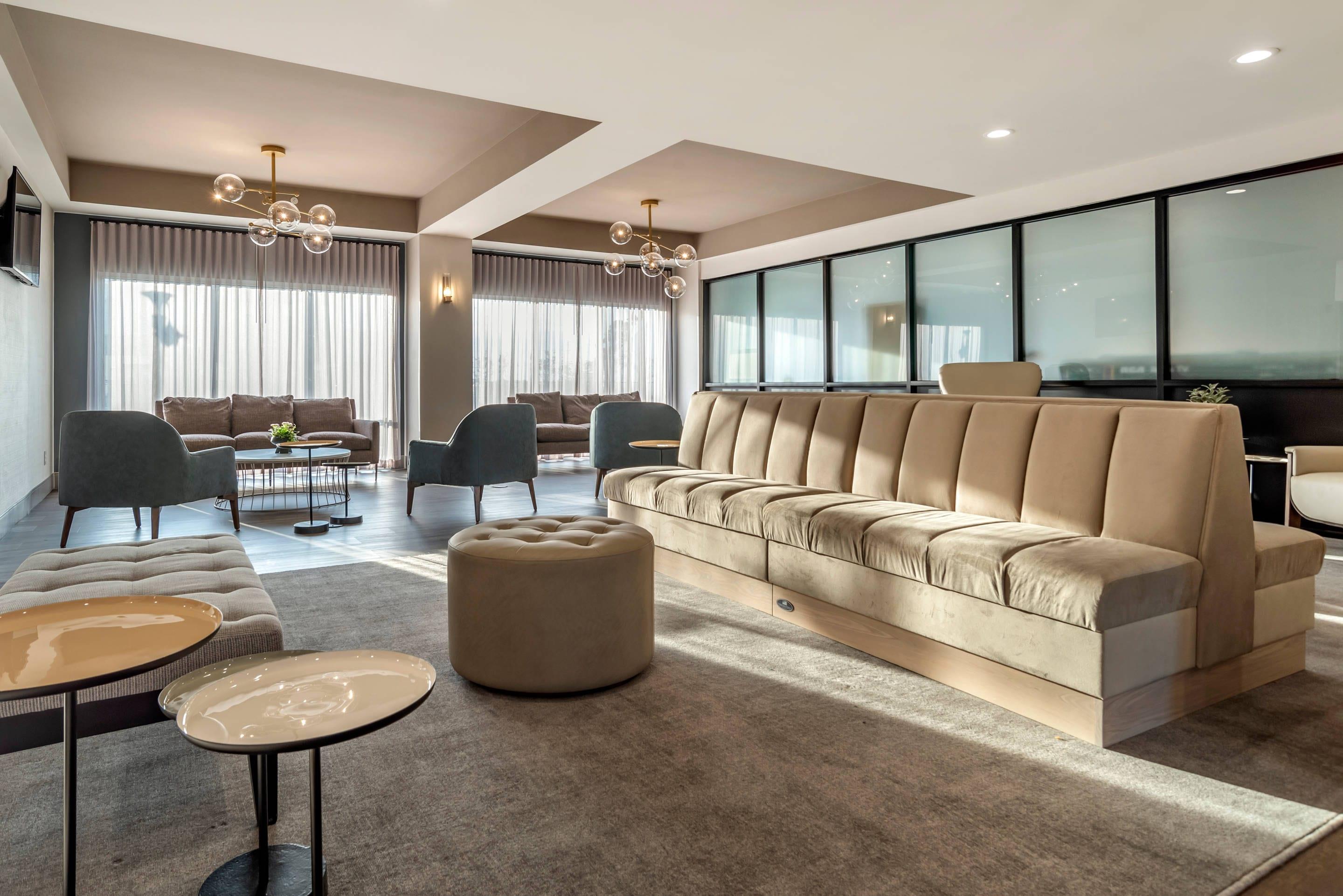 Spacious lobby with sitting area | Lyric Hotel West End, Ascend Hotel Collection