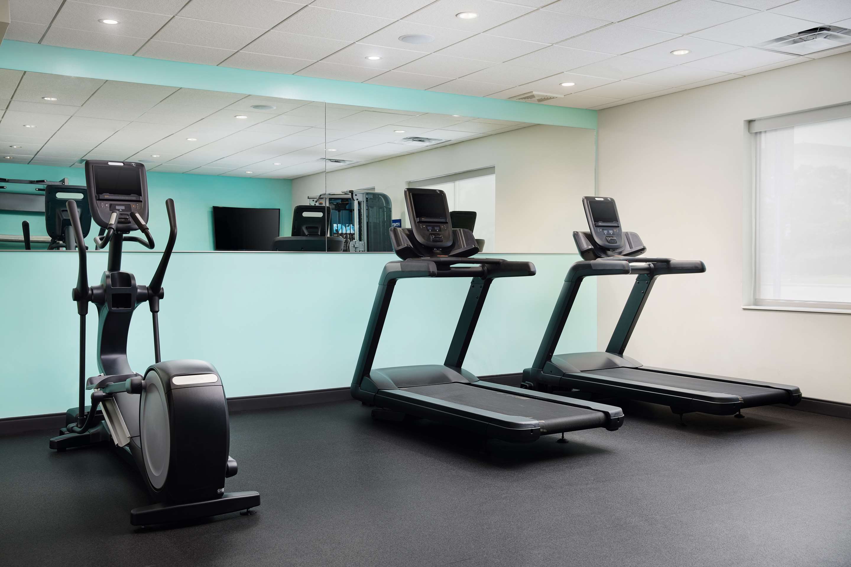 Health club fitness center gym | Tru by Hilton Charleston Airport