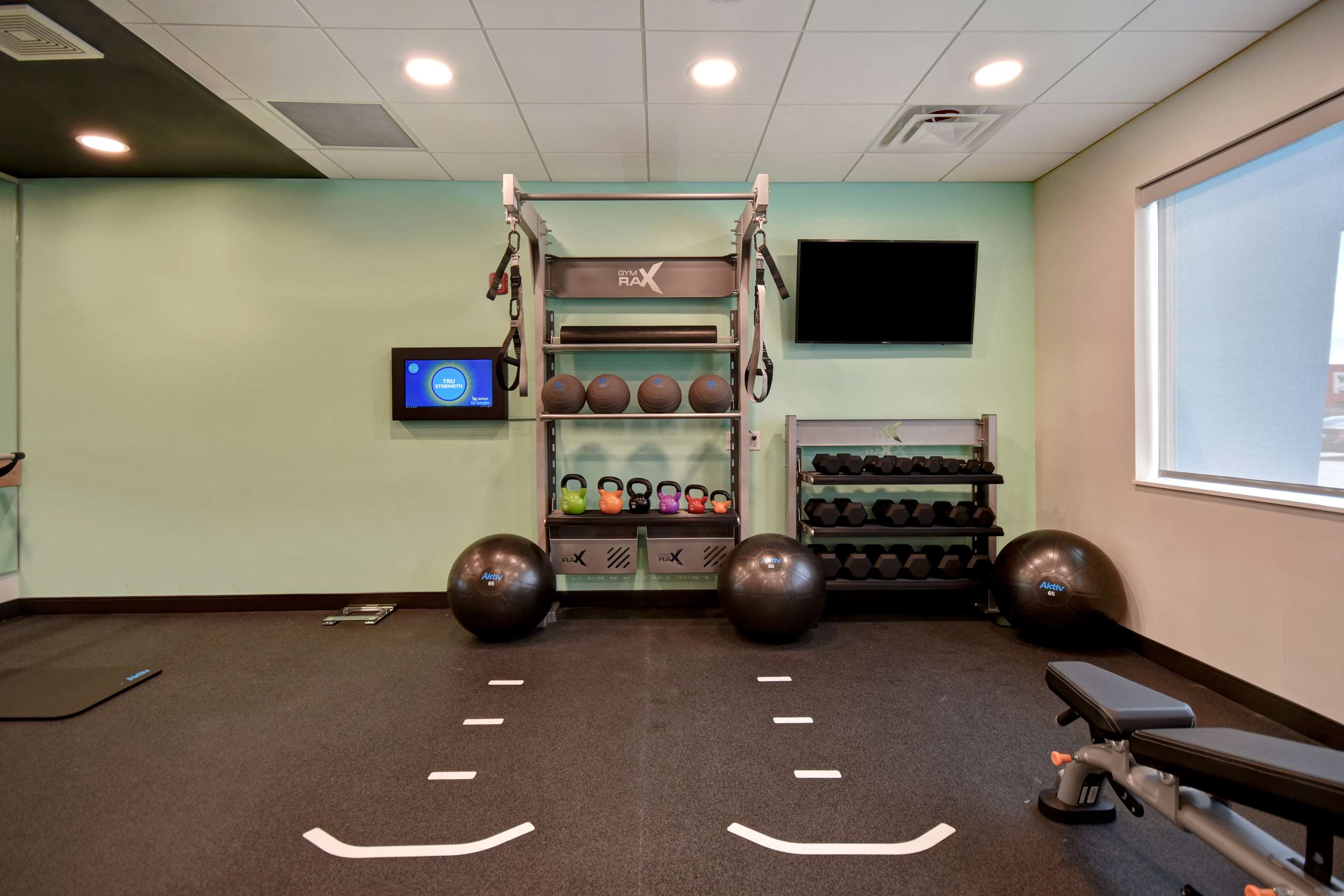 Health club fitness center gym | Tru by Hilton Auburn