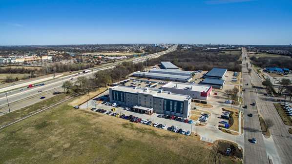 Exterior view - WoodSpring Suites Central Legacy Drive Plano