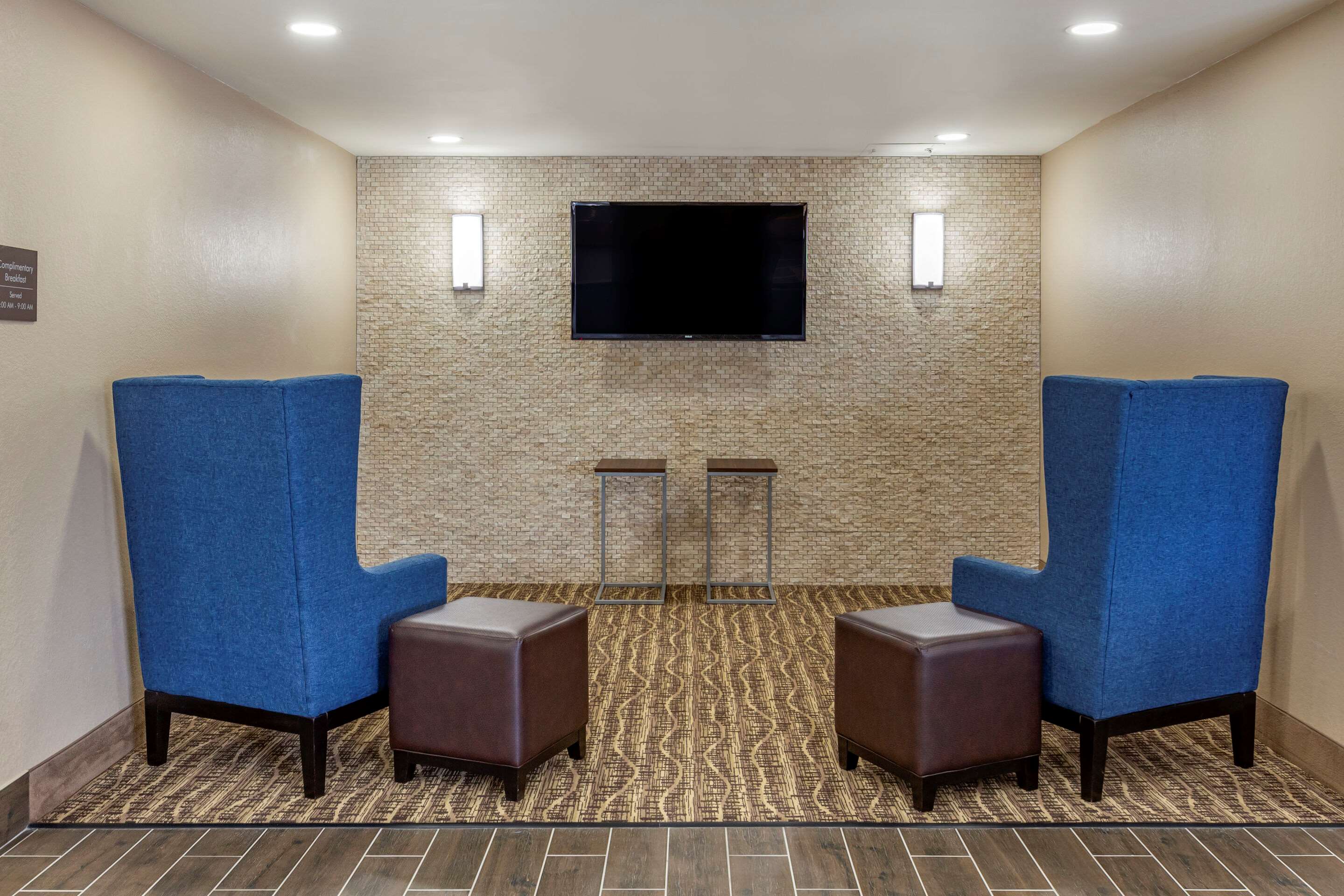 Lobby with sitting area | Comfort Inn & Suites Spring Lake - Fayetteville Near Fort Liberty