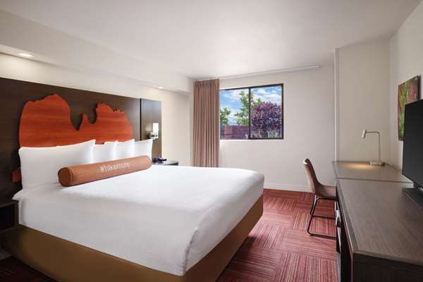 Accessible - 1 Queen, Mobility Accessible, Communication Assistance, Roll In Shower, Mini Fridge, In-Room Safe, Non-Smoking, Continental Breakfast