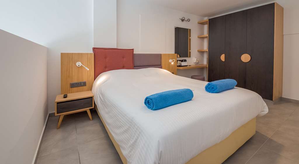 PROTARAS PLAZA HOTEL-guestroom-Guest Room,Suite,On-Site.jpg
